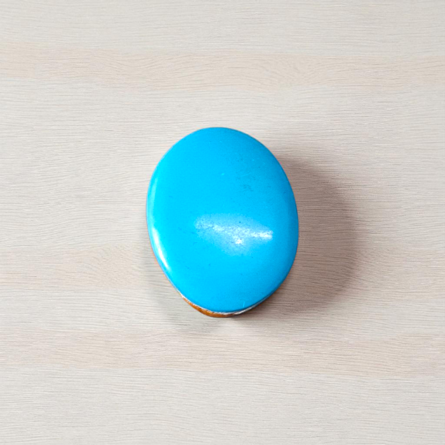 High-quality image of a natural turquoise (Firoza) gemstone with blue-green hues, polished surface, used for healing, confidence, and spiritual purposes