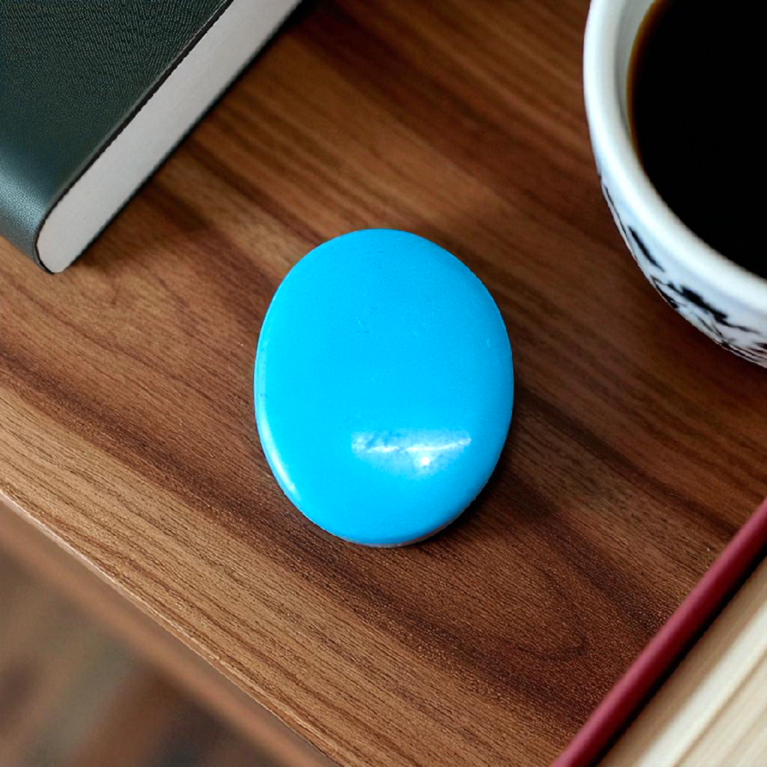 High-quality image of a natural turquoise (Firoza) gemstone with blue-green hues, polished surface, used for healing, confidence, and spiritual purposes