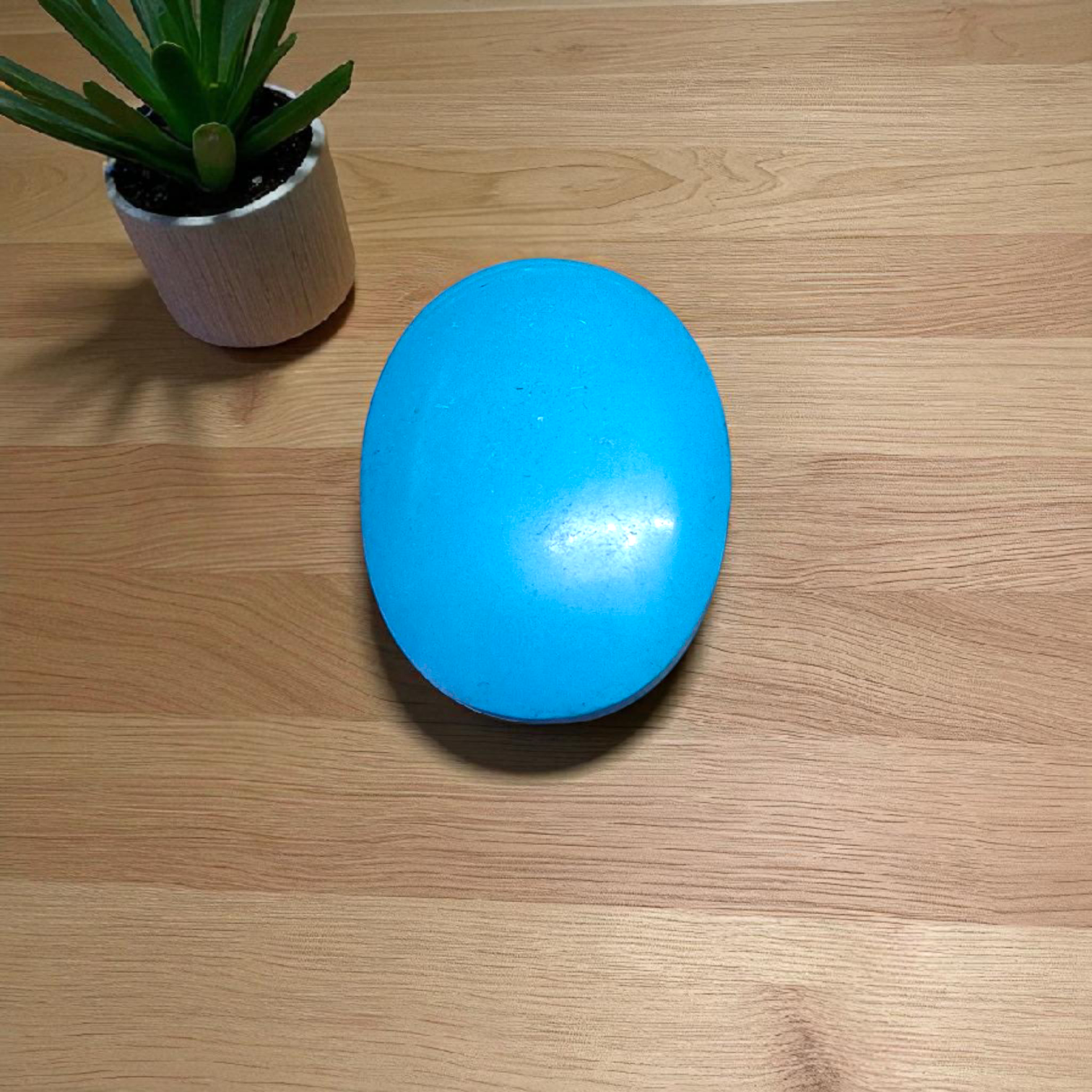 High-quality image of a natural turquoise (Firoza) gemstone with blue-green hues, polished surface, used for healing, confidence, and spiritual purposes