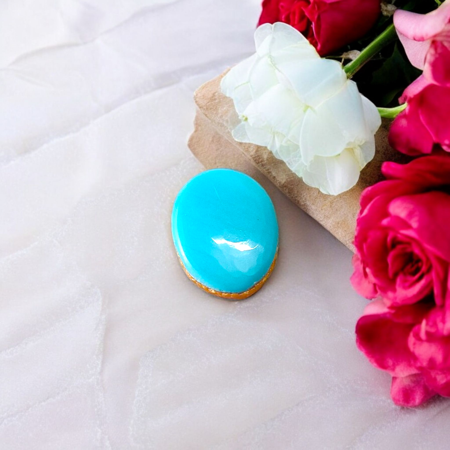 High-quality image of a natural turquoise (Firoza) gemstone with blue-green hues, polished surface, used for healing, confidence, and spiritual purposes