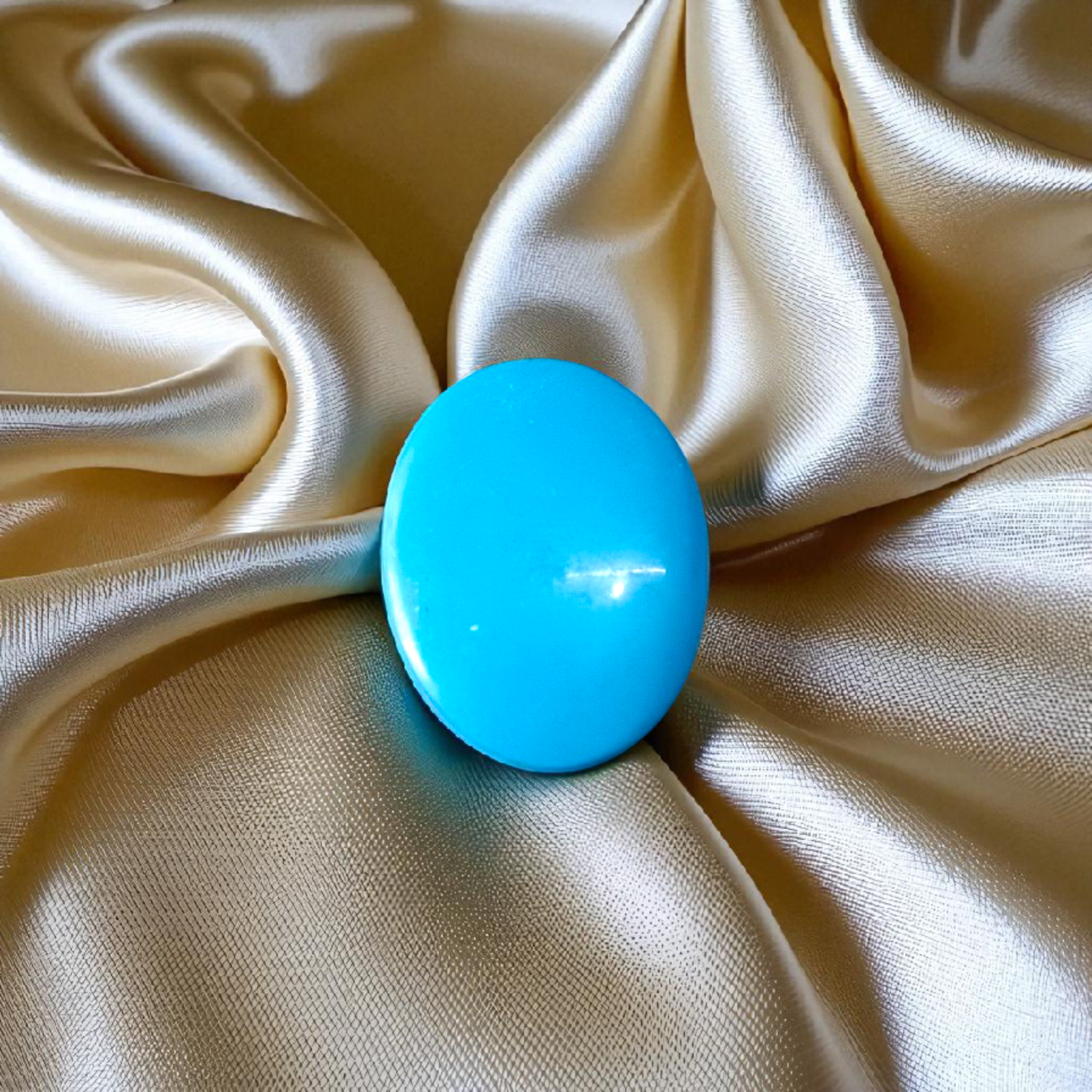 High-quality image of a natural turquoise (Firoza) gemstone with blue-green hues, polished surface, used for healing, confidence, and spiritual purposes