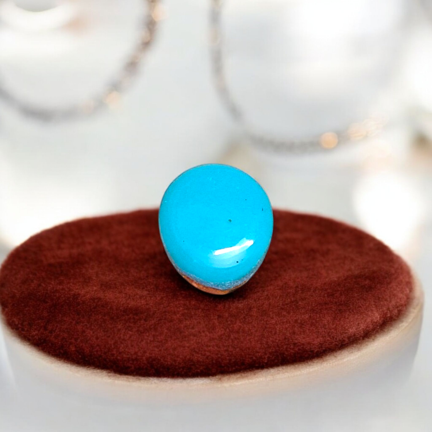 High-quality image of a natural turquoise (Firoza) gemstone with blue-green hues, polished surface, used for healing, confidence, and spiritual purposes