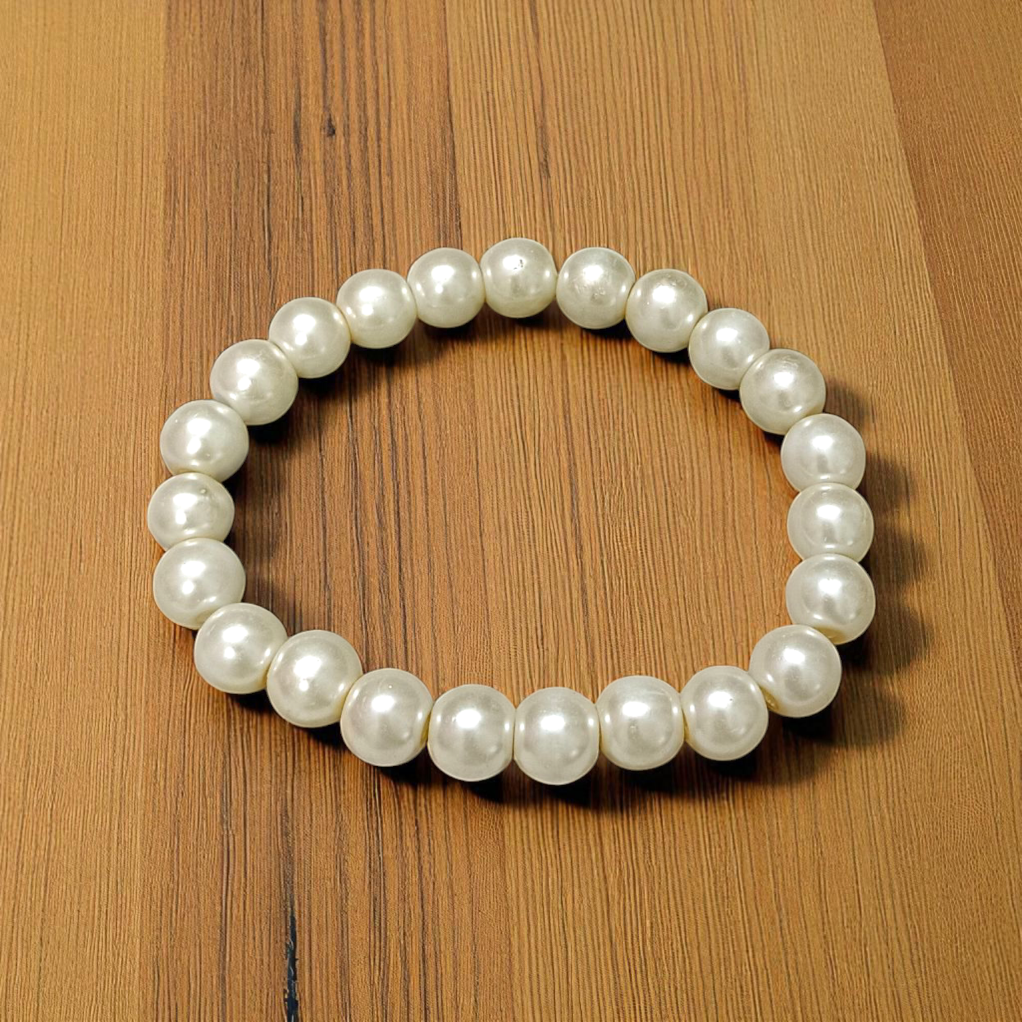 Natural Pearl Bracelet with 8mm round white pearls, stretchable design, perfect for men and women, displayed on a clean background
