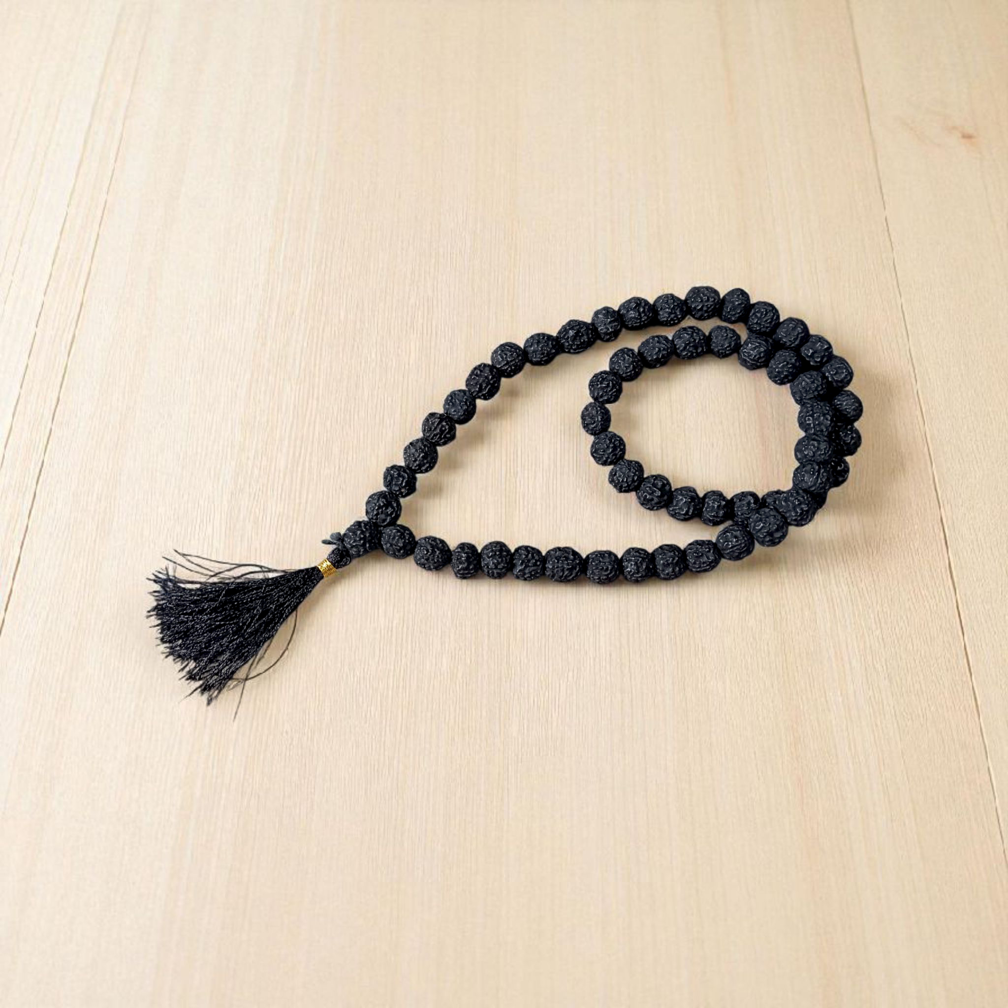 Image of Black Rudraksha Mala with 54+1 lab-certified 8–9mm beads, hand-knotted for mantra chanting, meditation, and spiritual wear — offered by Timeshopee