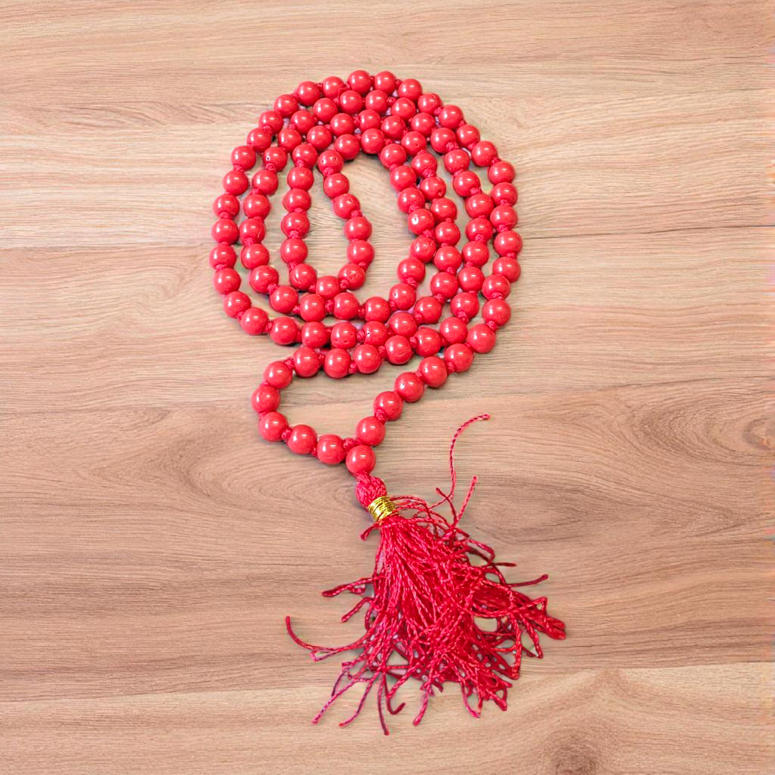 Image of Lal Moonga Mala (Red Coral Mala) made of 108+1 natural red coral beads, size 6mm, neatly strung, ideal for puja, astrology, and meditation
