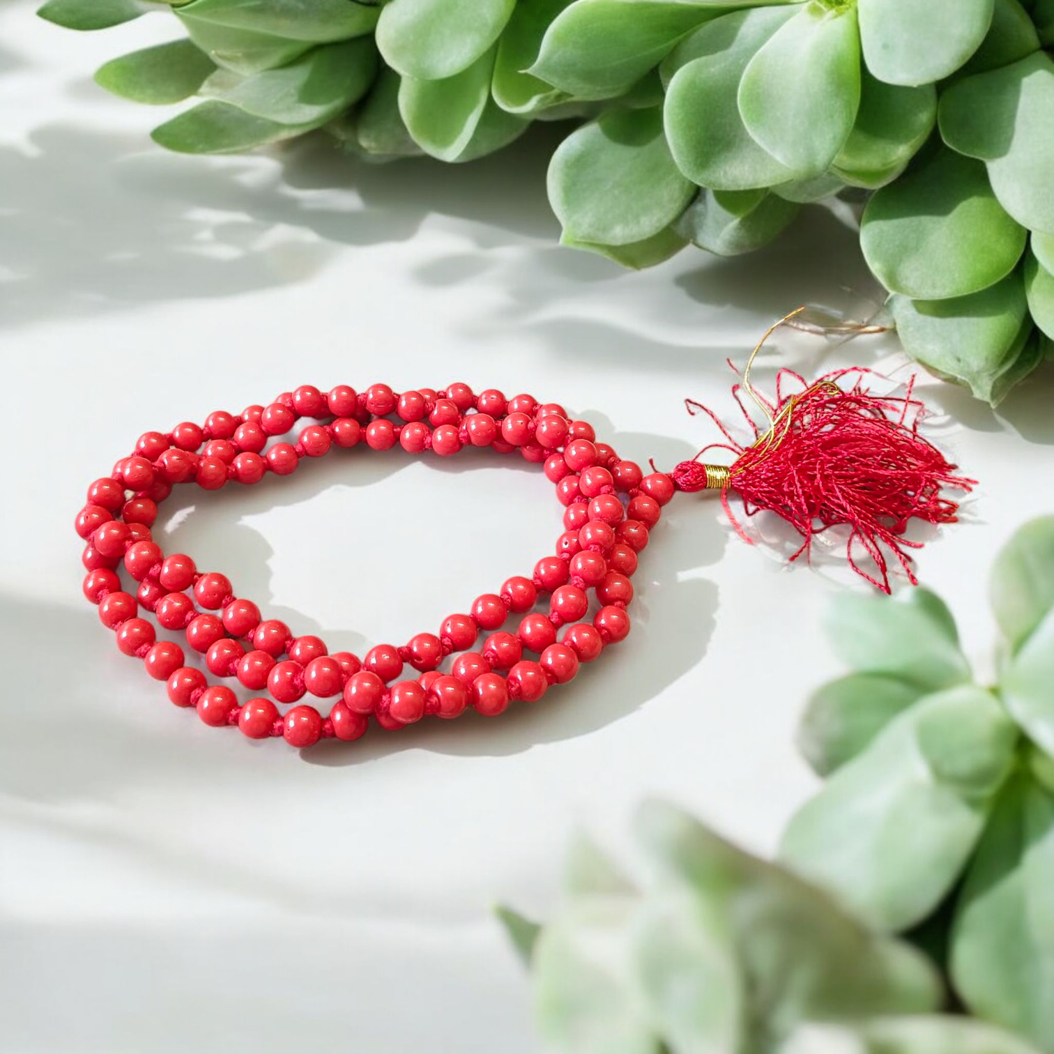 Image of Lal Moonga Mala (Red Coral Mala) made of 108+1 natural red coral beads, size 6mm, neatly strung, ideal for puja, astrology, and meditation