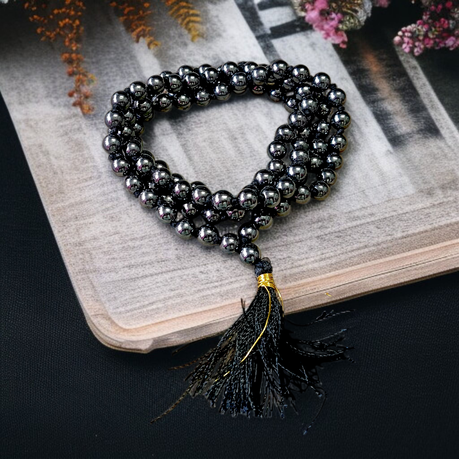 Image of Magnet Mala made of 108+1 magnetic beads, 8mm each, strung in traditional style, used for meditation, energy balancing, and stylish spiritual wear