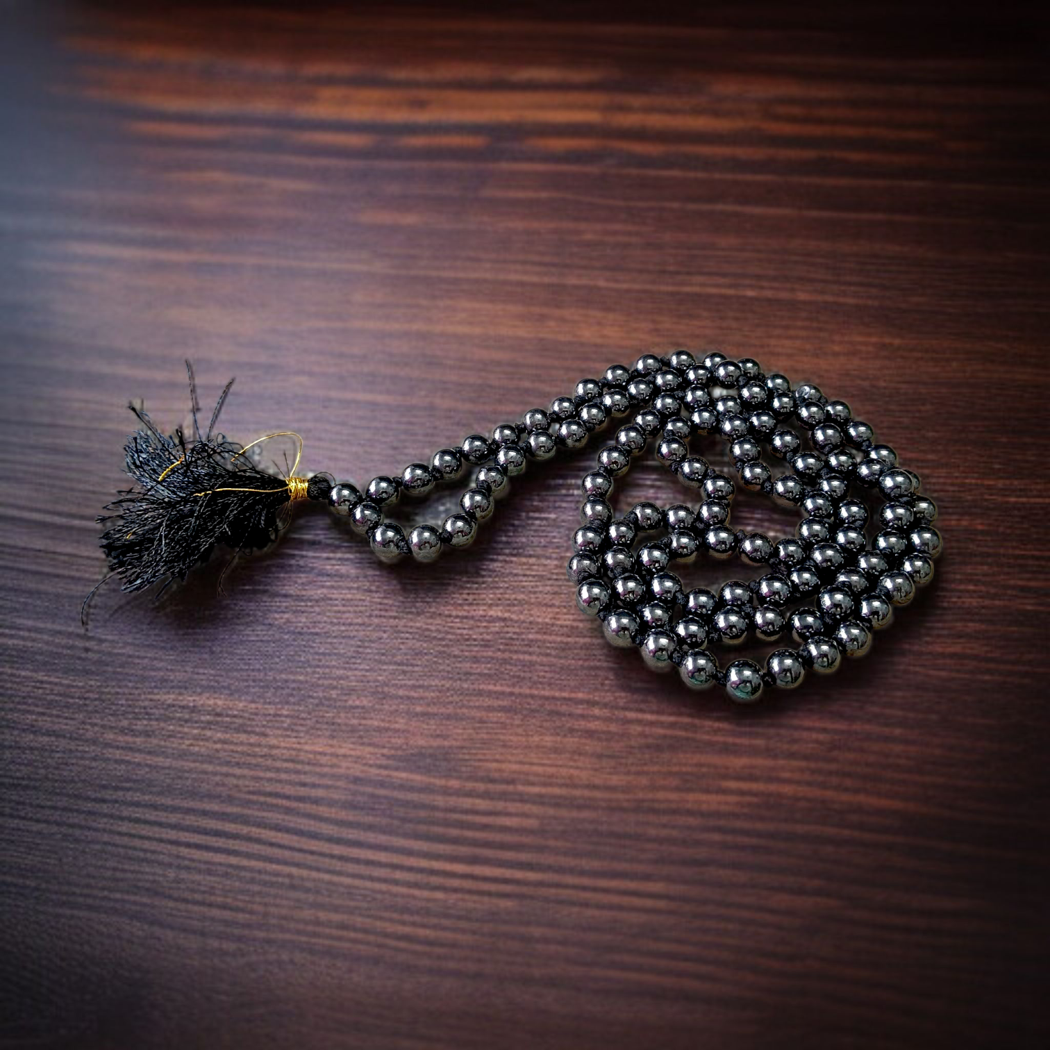 Image of Magnet Mala made of 108+1 magnetic beads, 8mm each, strung in traditional style, used for meditation, energy balancing, and stylish spiritual wear