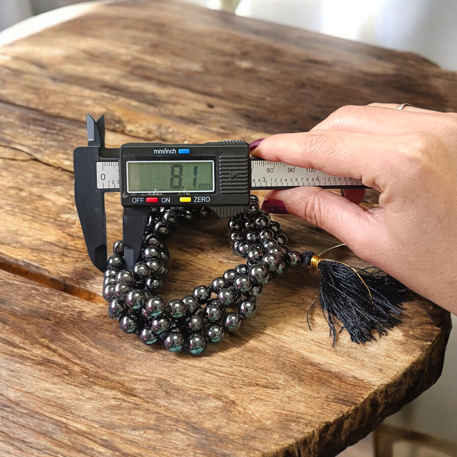 Image of Magnet Mala made of 108+1 magnetic beads, 8mm each, strung in traditional style, used for meditation, energy balancing, and stylish spiritual wear
