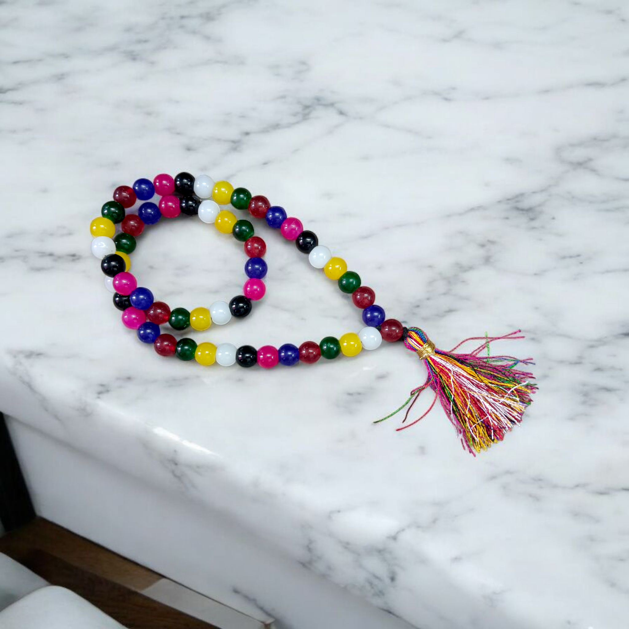 Image of Mix Agate Mala with 54+1 colorful 8mm polished beads, representing all chakras, designed for meditation, healing, and spiritual well-being
