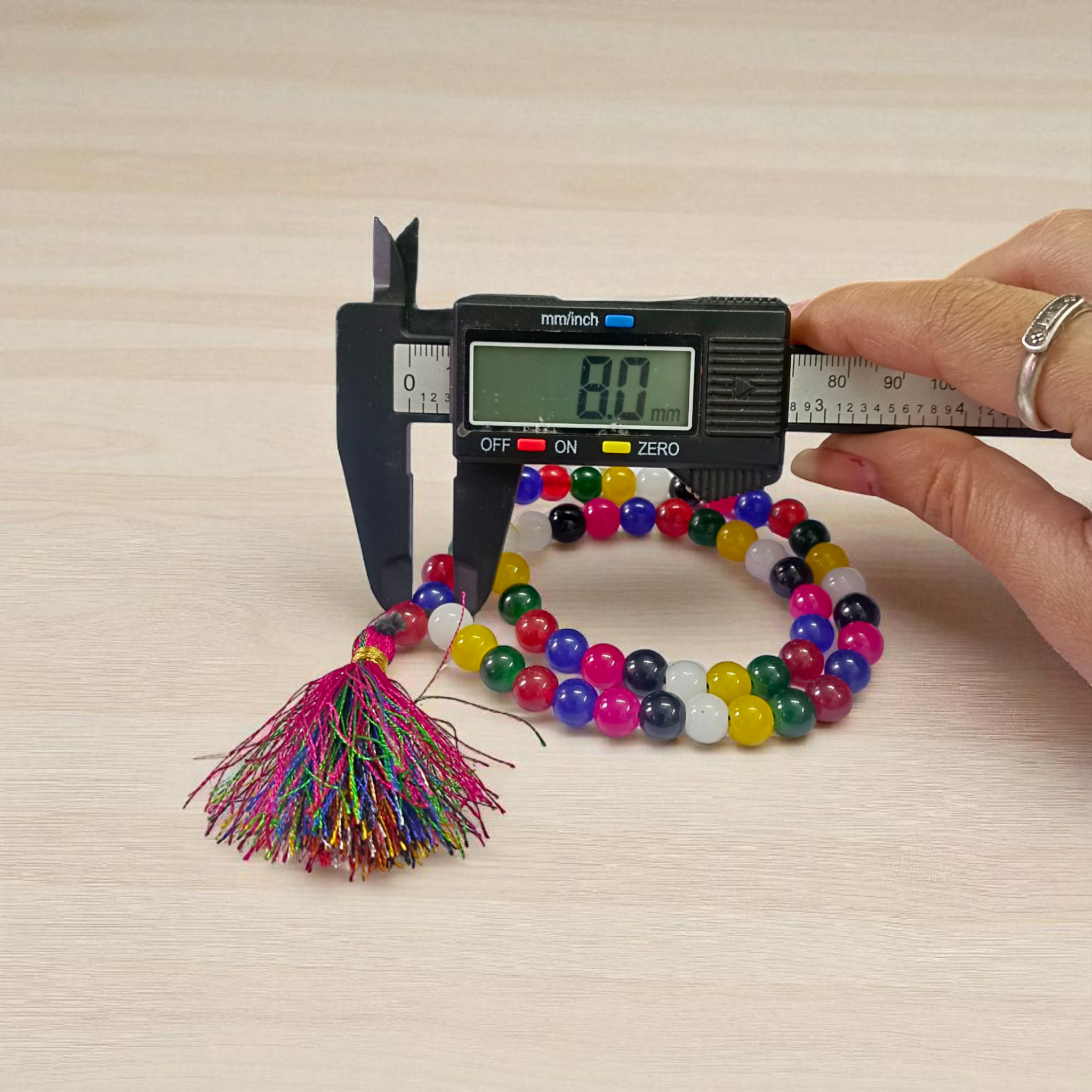 Image of Mix Agate Mala with 54+1 colorful 8mm polished beads, representing all chakras, designed for meditation, healing, and spiritual well-being