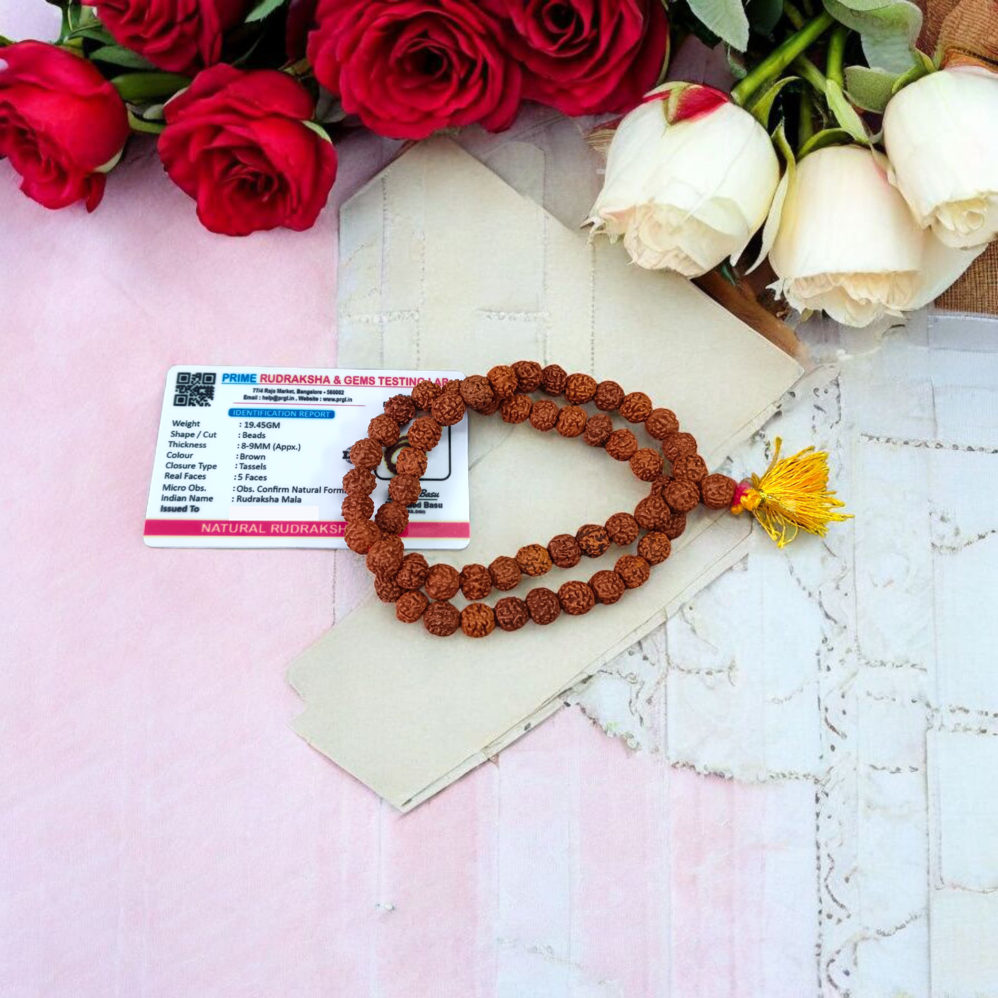 Image of Natural 5 Mukhi Rudraksha Jaap Mala made of 8mm round brown beads, arranged neatly for chanting and meditation purposes