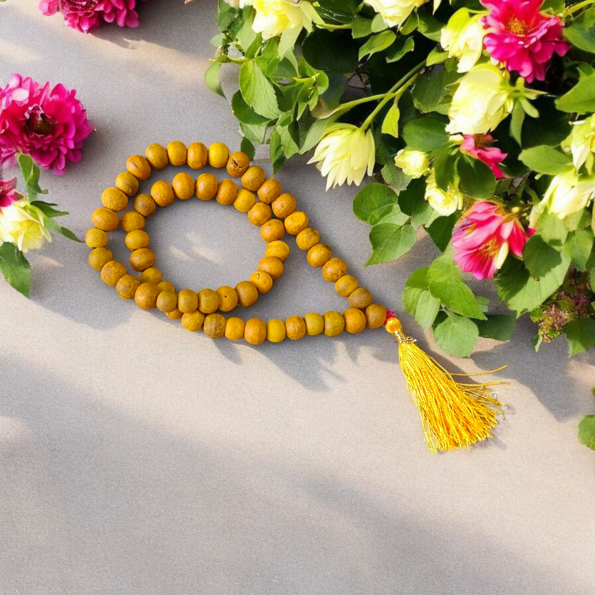 Image of Natural Haldi (Turmeric) Mala with 54+1 hand-knotted 7mm beads, lab certified, offered by Timeshopee – Online Religious Store