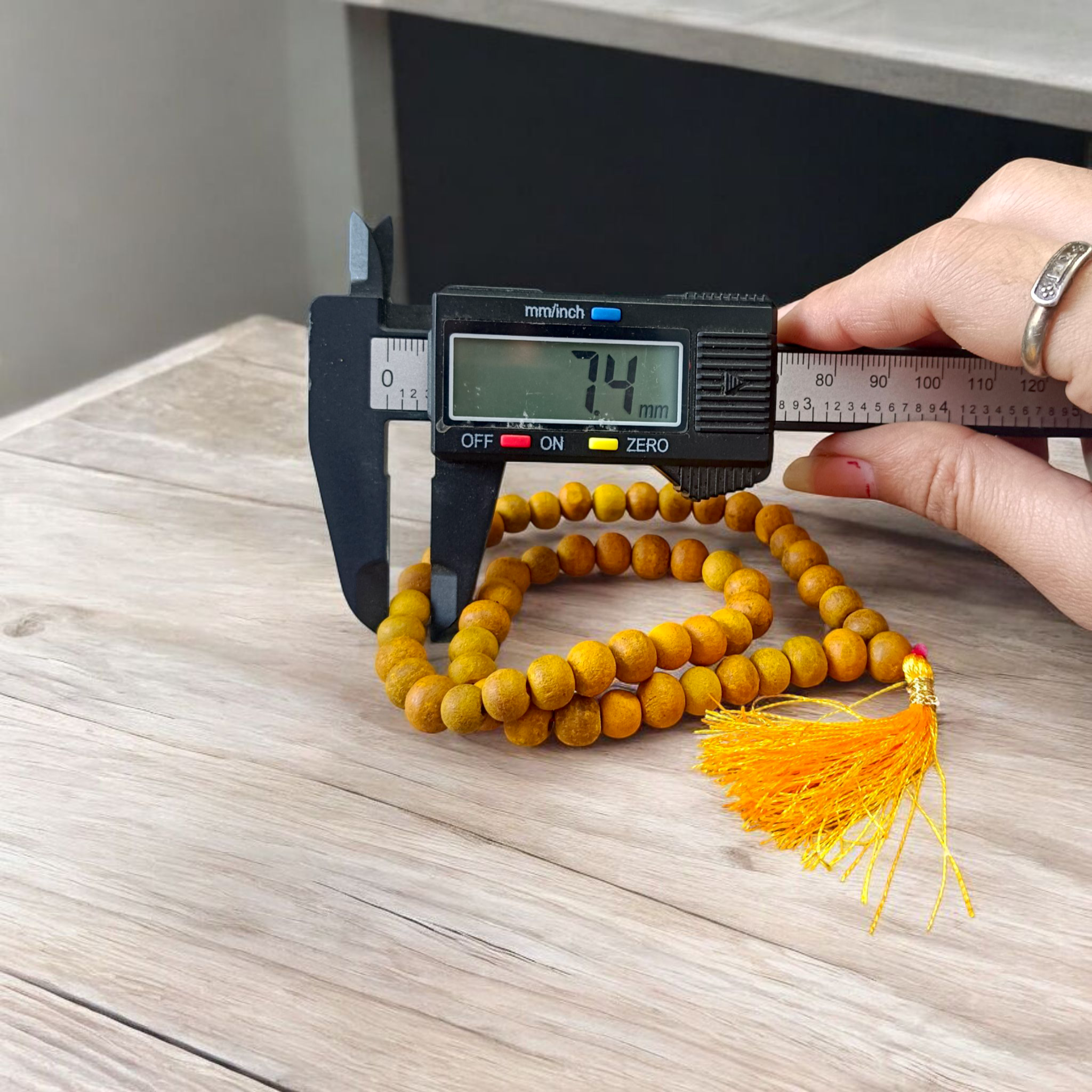 Image of Natural Haldi (Turmeric) Mala with 54+1 hand-knotted 7mm beads, lab certified, offered by Timeshopee – Online Religious Store