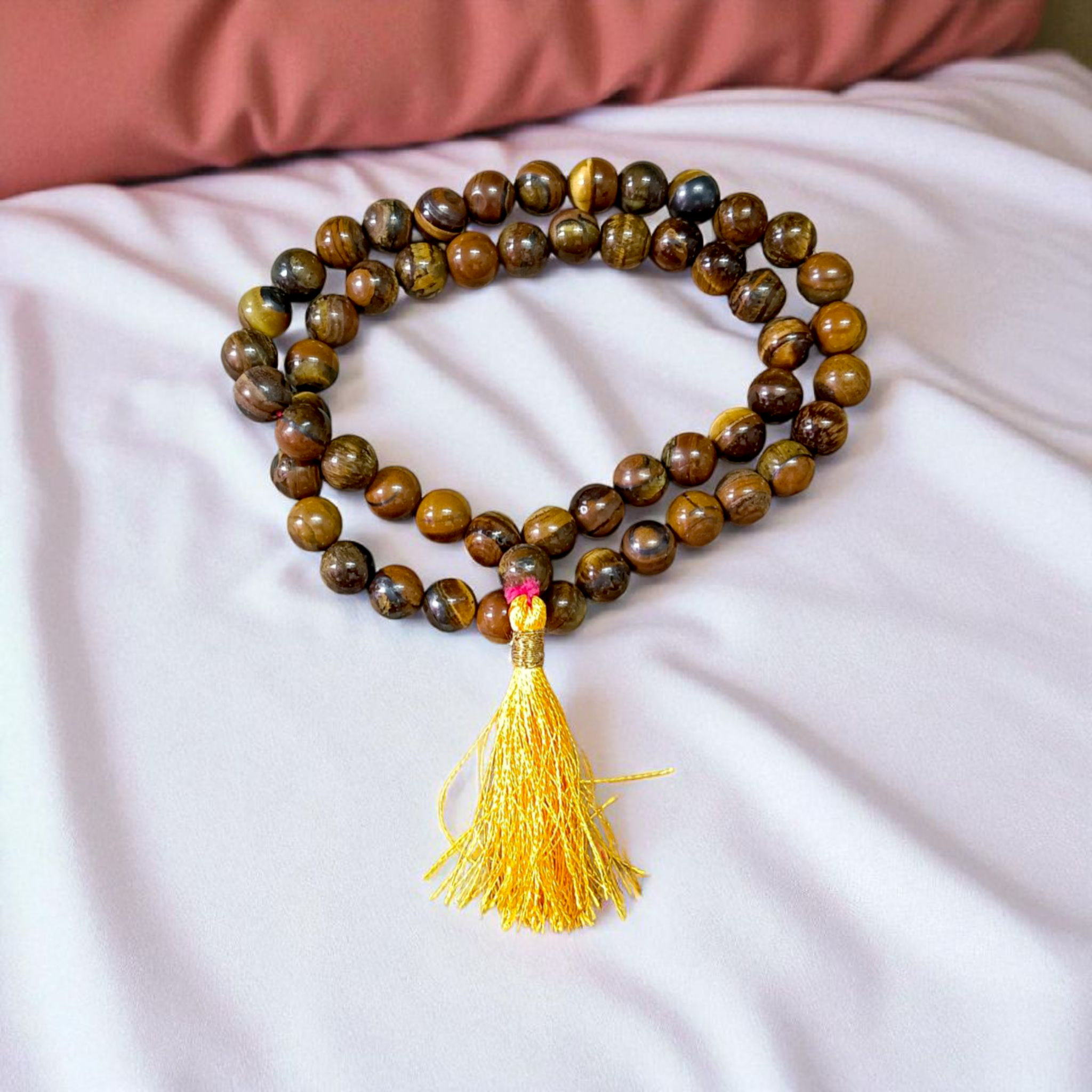 Image of Natural Tiger Eye Mala with 54+1 hand-knotted 8mm lab-certified beads, used for grounding, meditation, and spiritual wear — sold by Timeshopee