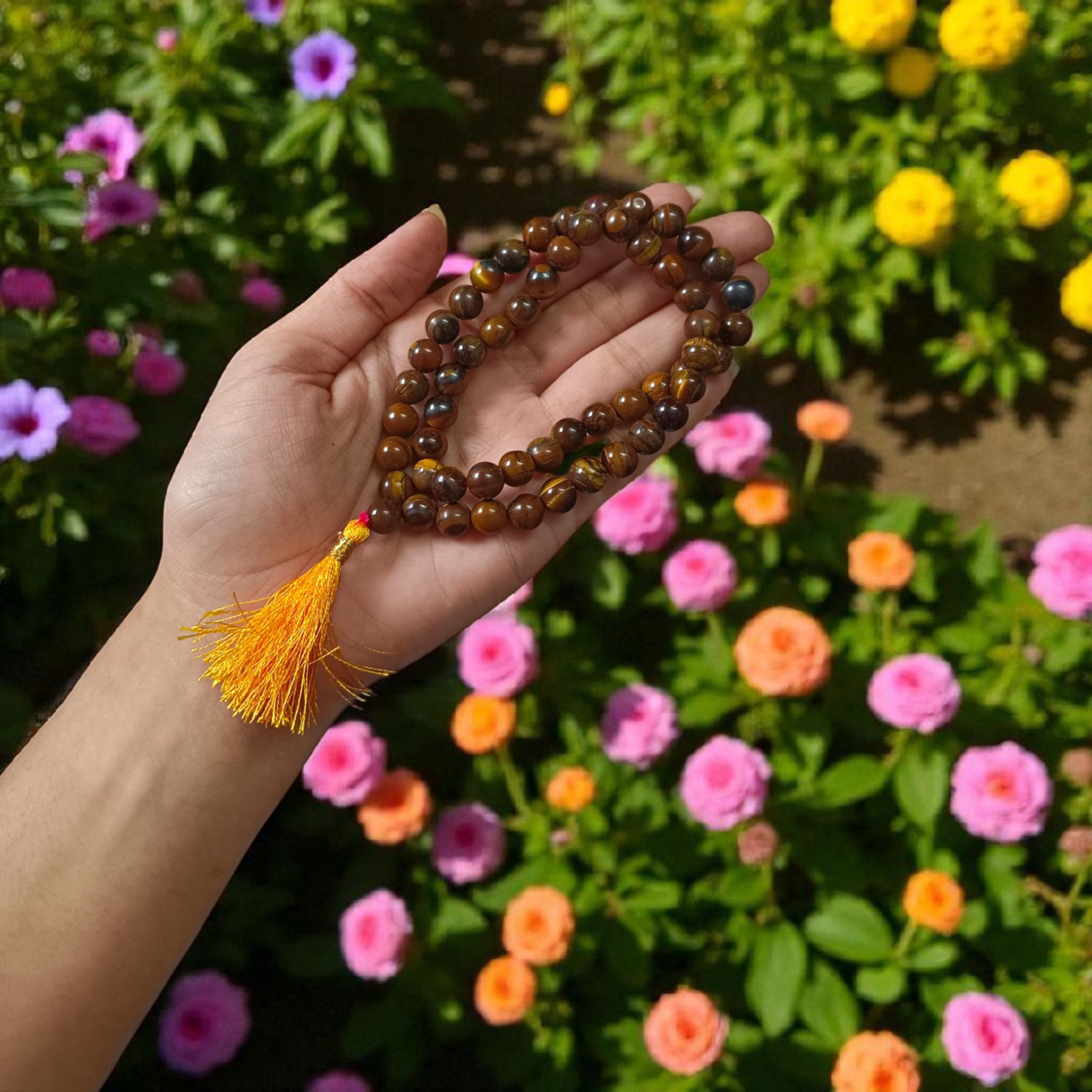 Image of Natural Tiger Eye Mala with 54+1 hand-knotted 8mm lab-certified beads, used for grounding, meditation, and spiritual wear — sold by Timeshopee