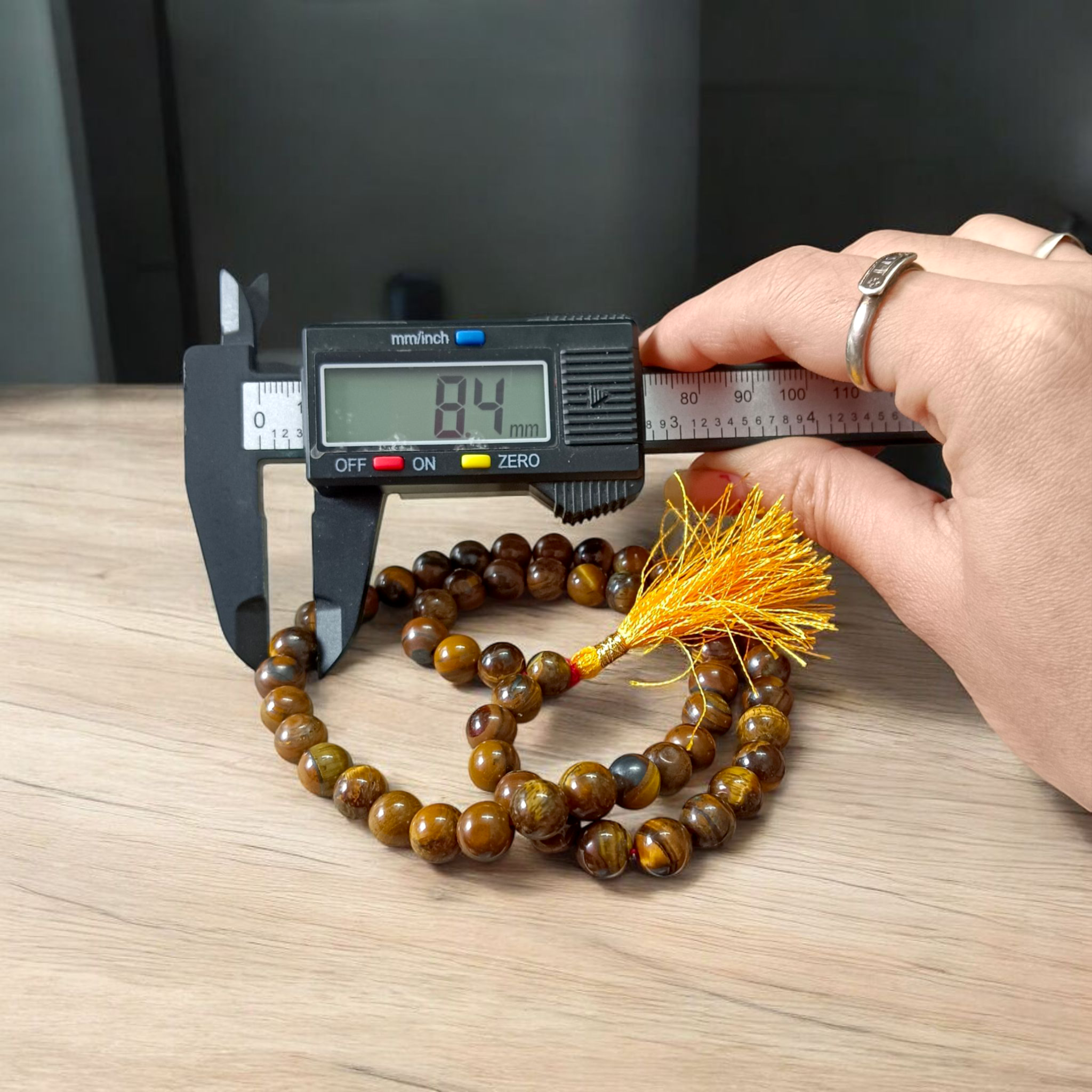 Image of Natural Tiger Eye Mala with 54+1 hand-knotted 8mm lab-certified beads, used for grounding, meditation, and spiritual wear — sold by Timeshopee