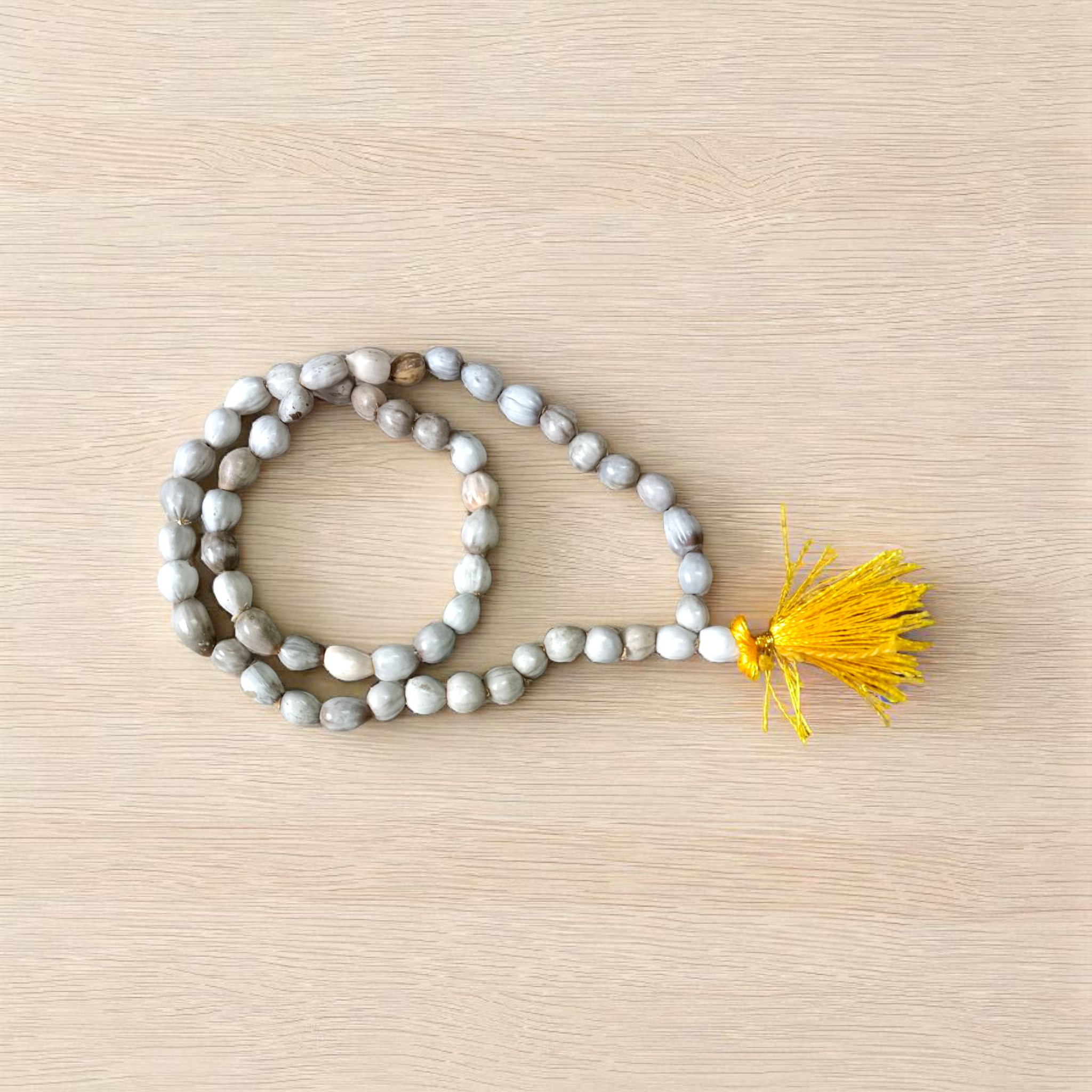 Image of Natural Vaijanti Mala with 54+1 hand-knotted 5–7mm lab-certified forest seed beads, ideal for mantra jaap, devotion, and spiritual use — by Timeshopee