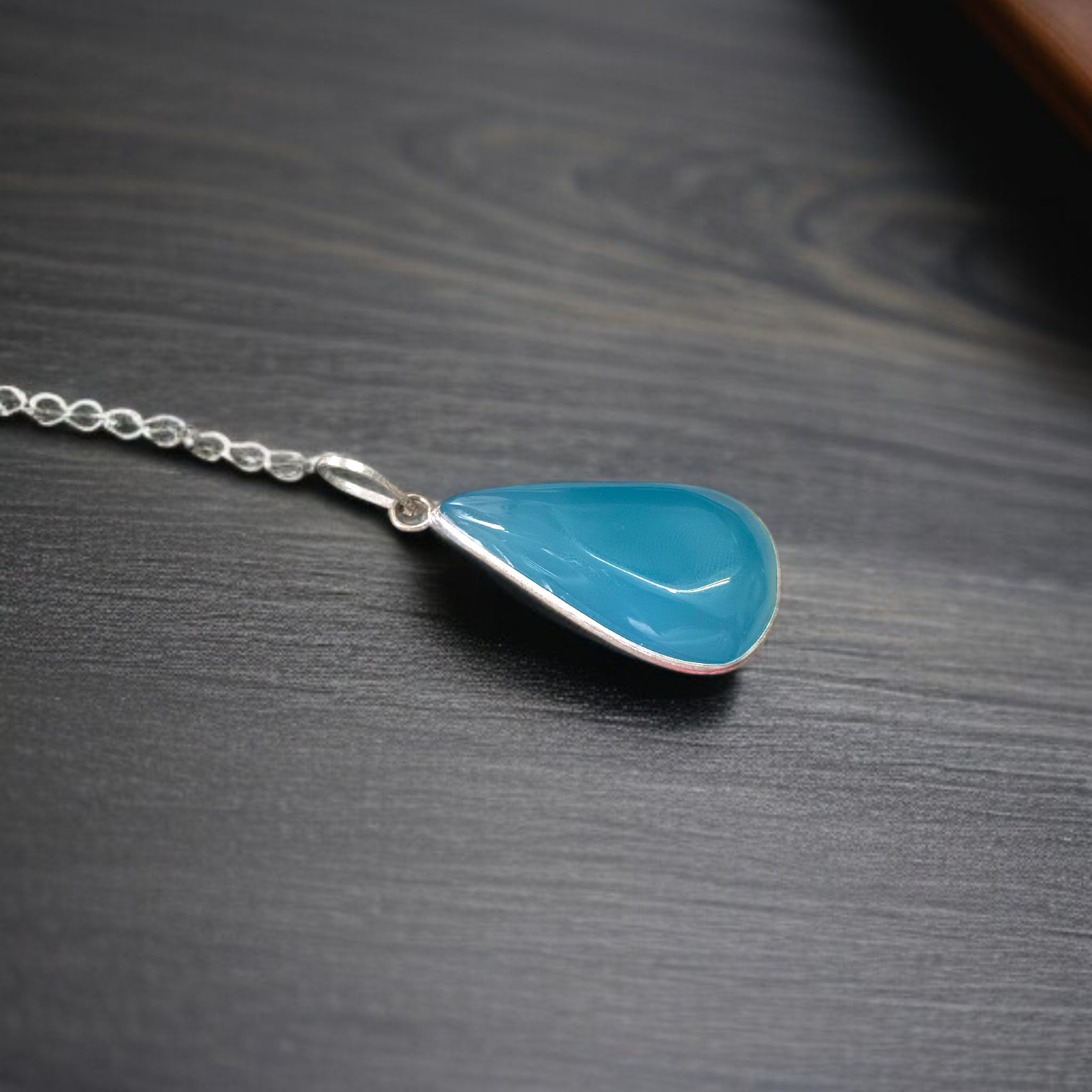 Image of a handcrafted, lab-certified original turquoise (Firoza) pendant designed for healing, meditation, and daily wear