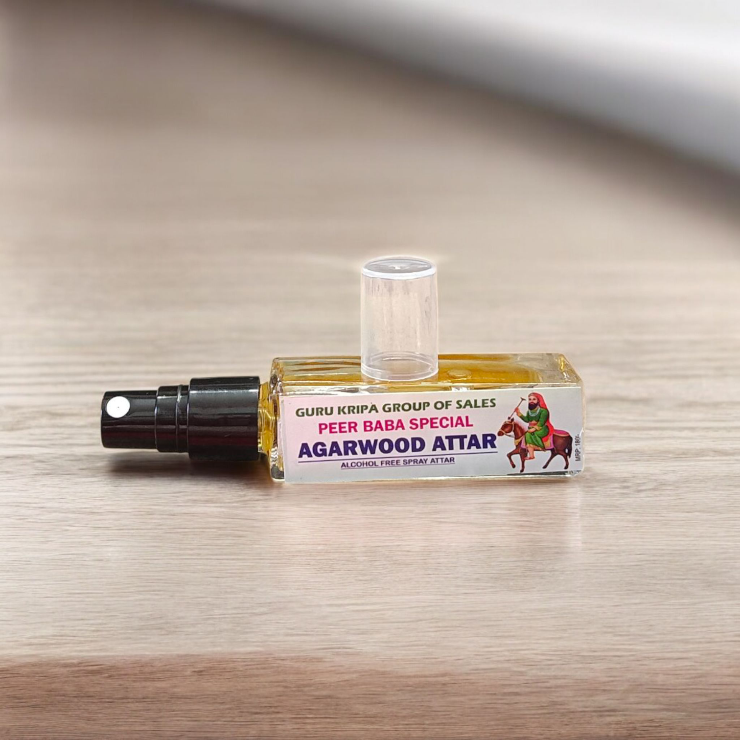 Image showing a 25ML bottle of Peer Baba Agarwood Spray Attar with elegant packaging, labeled as alcohol-free and long-lasting fragrance