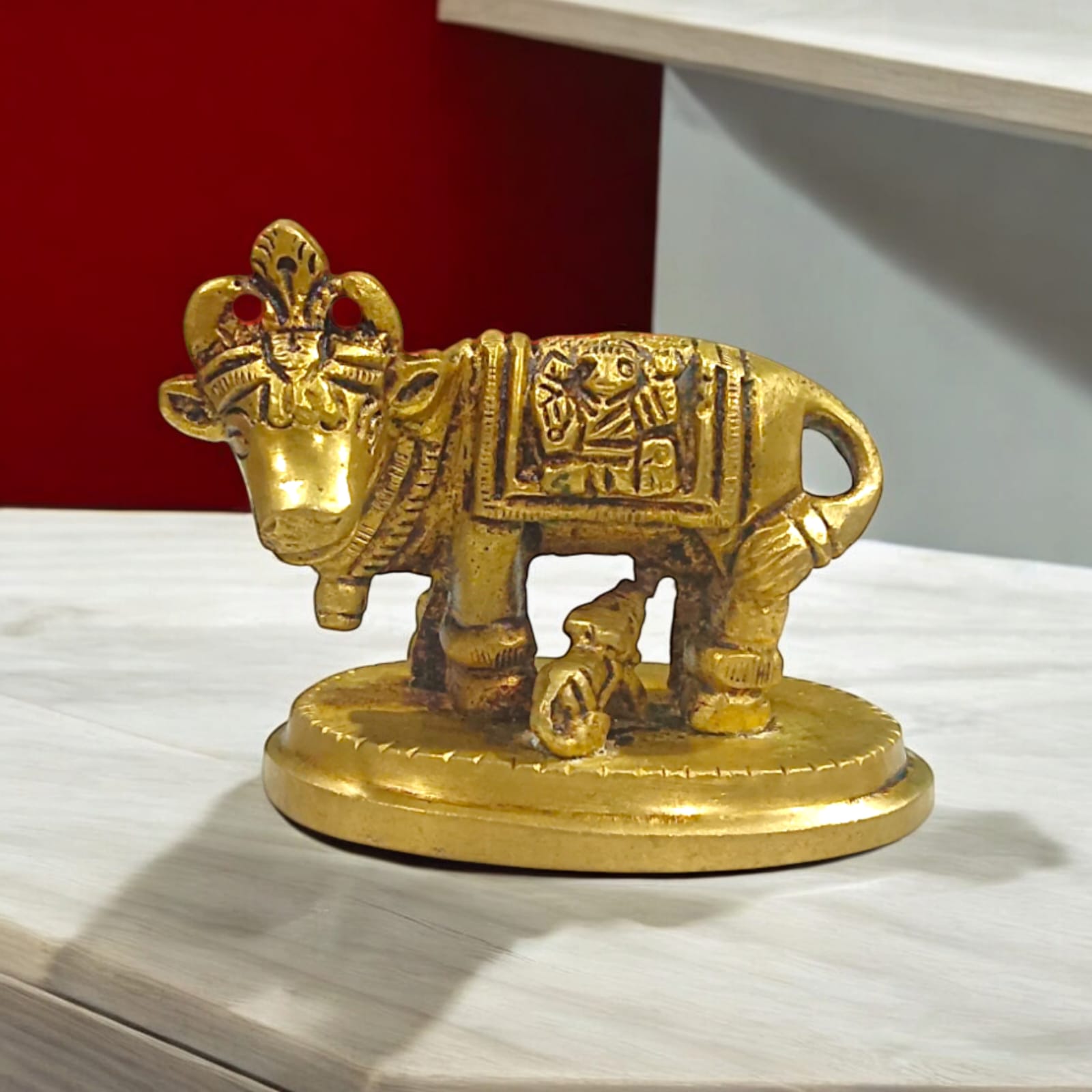 Kamdhenu Cow Brass Murti for worship, 5 cm tall, 7 cm wide, 211 grams, from Timeshopee