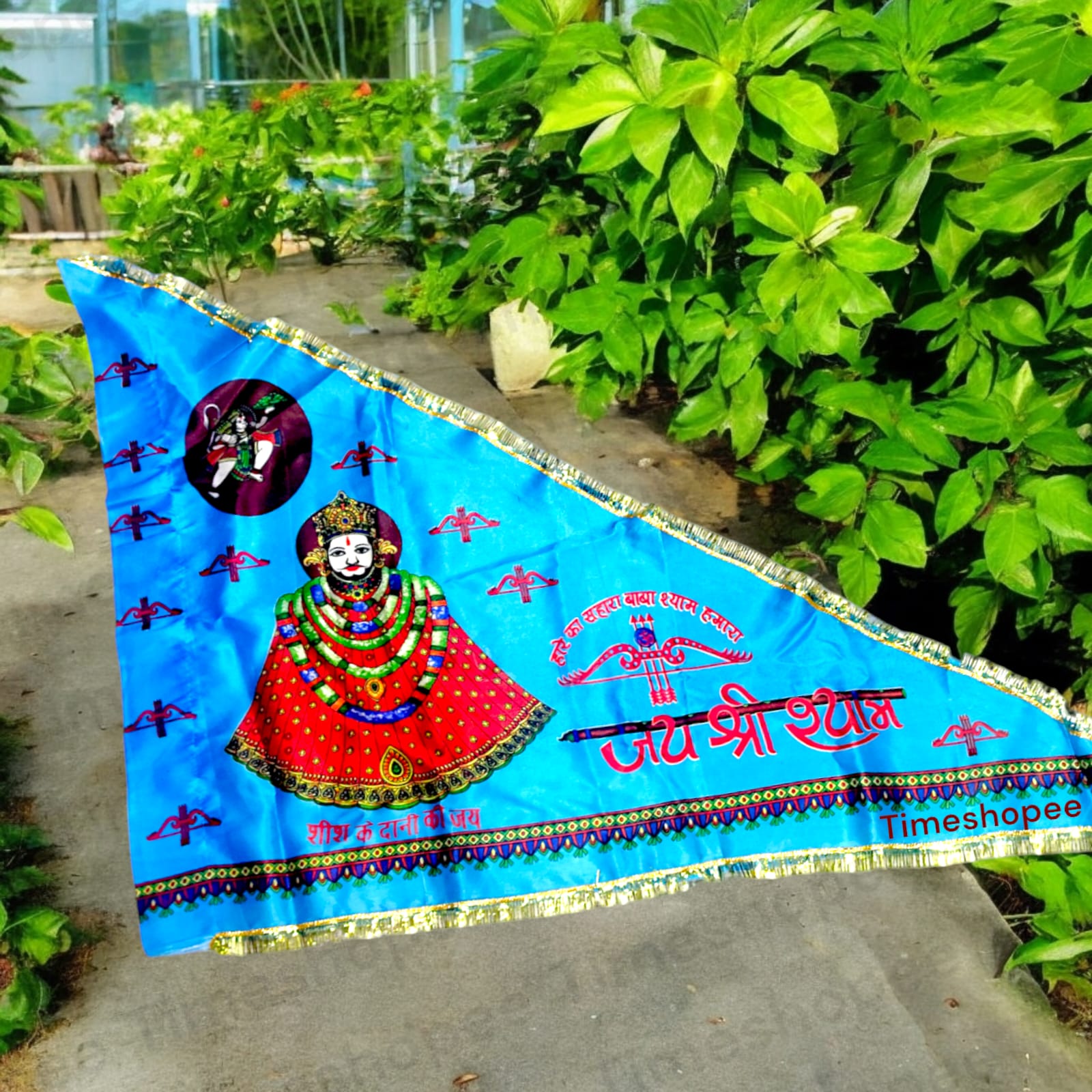 Khatu Shyam Ji Flag in blue, size 40"X60", with "Jai Shri Shyam" inscription, available at Timeshopee for worship and decoration.