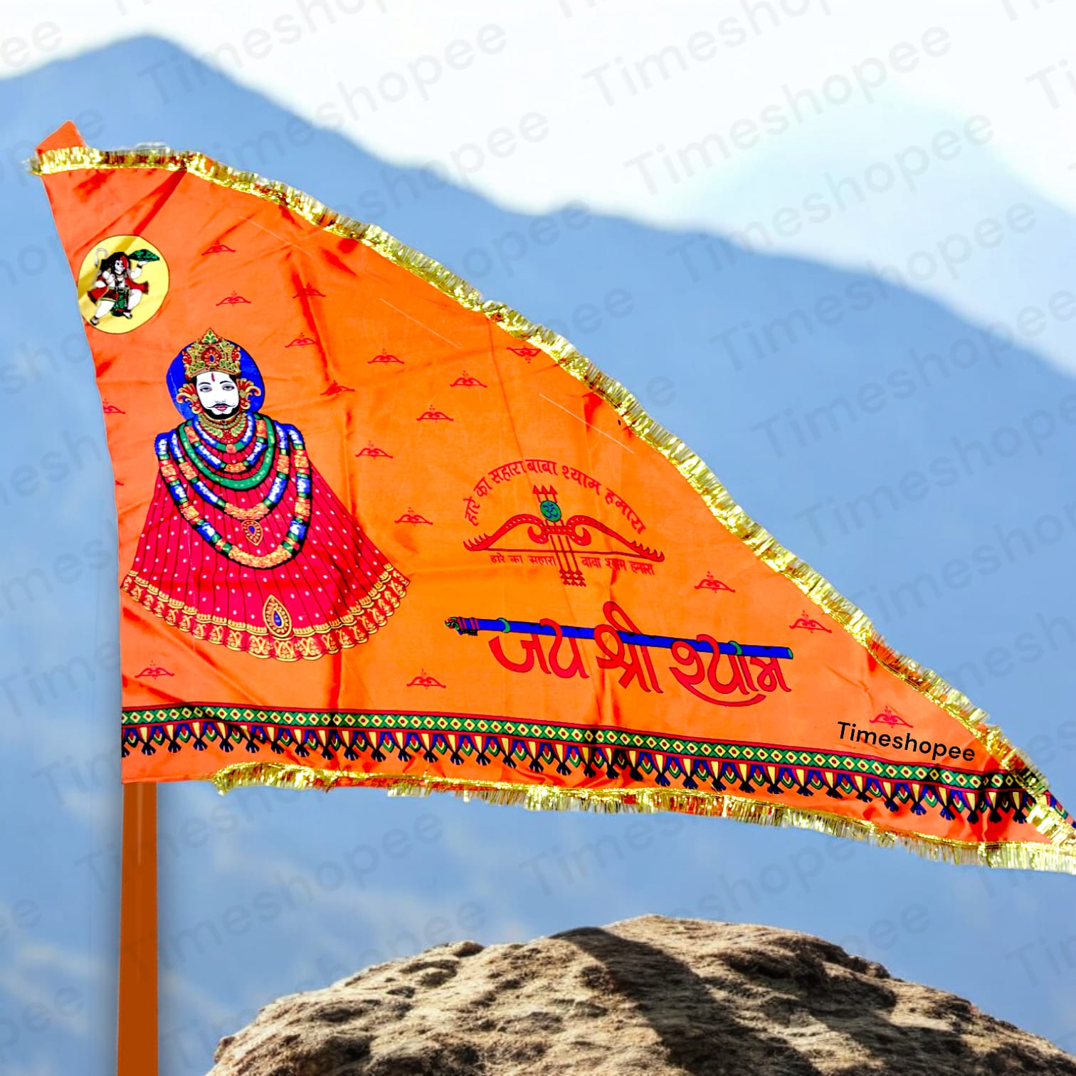 Khatu Shyam Ji Flag in orange, size 40"X60", with "Jai Shri Shyam" inscription, available at Timeshopee for worship and decoration.