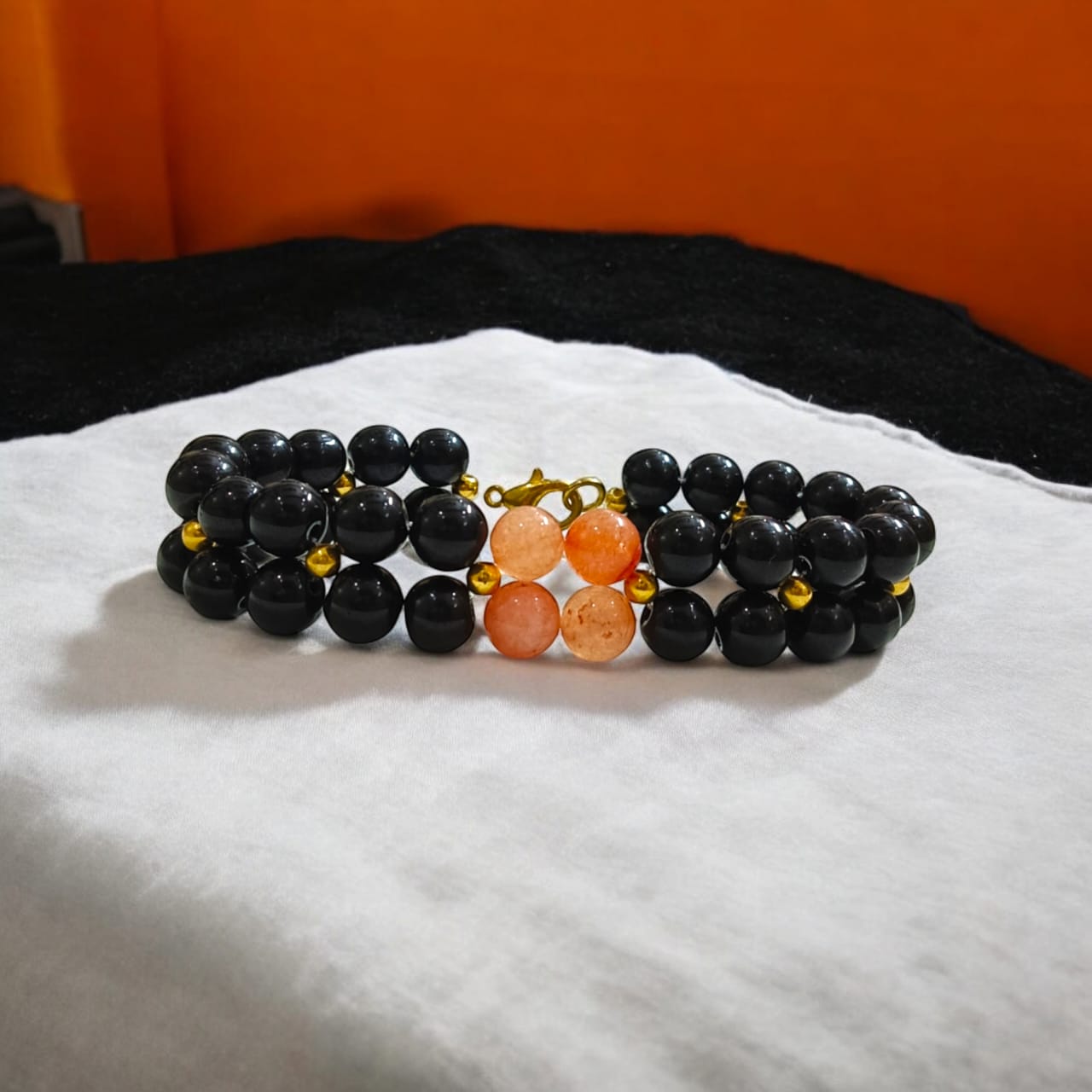 Lab-certified Black Agate and Hessonite bracelet with 8MM beads and golden lobster clasp, designed by Timeshopee for protection, enemy repellent, and spiritual growth.