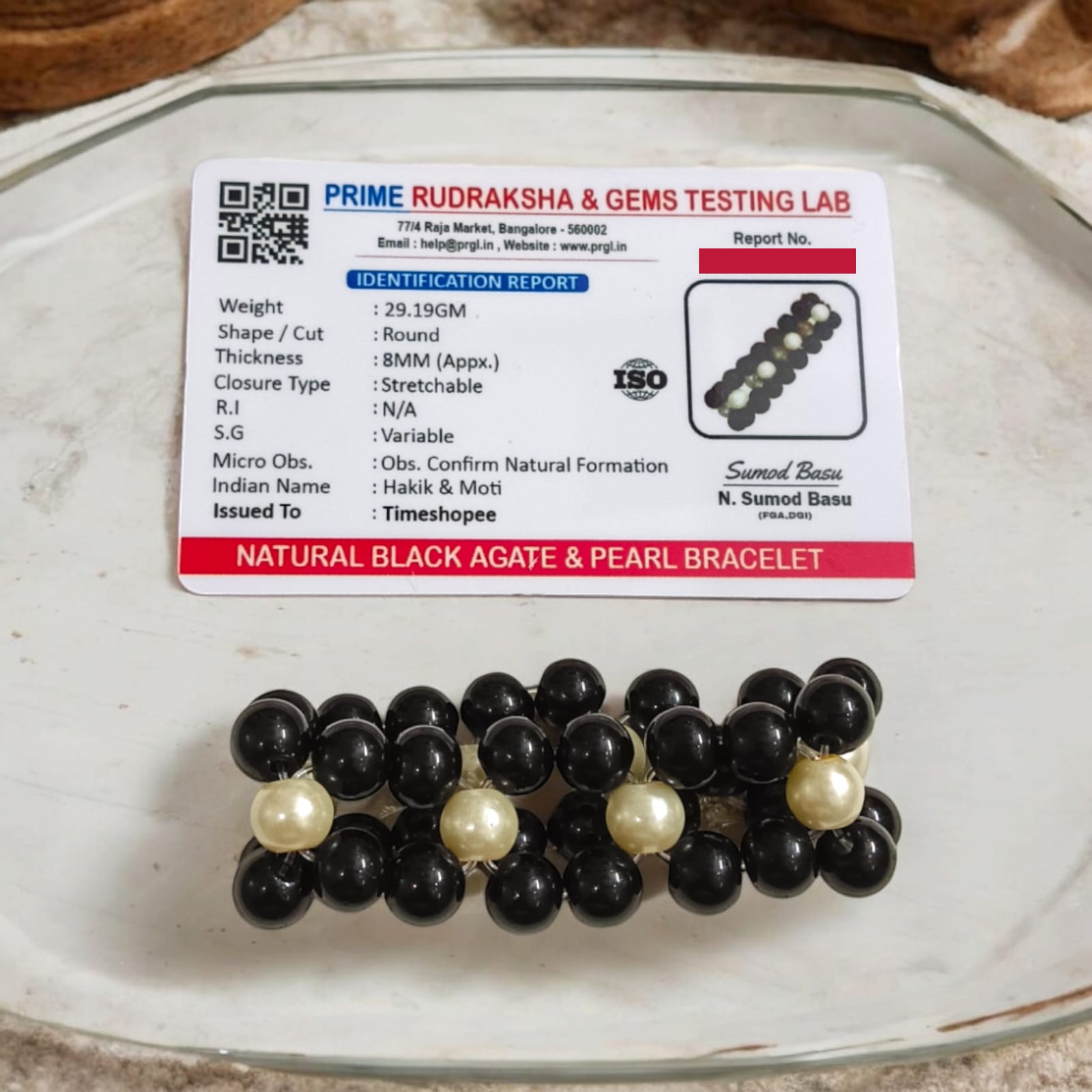 Lab-certified Black Agate and Pearl bracelet with 8MM stretchable beads, designed for protection, attraction, and spiritual growth.