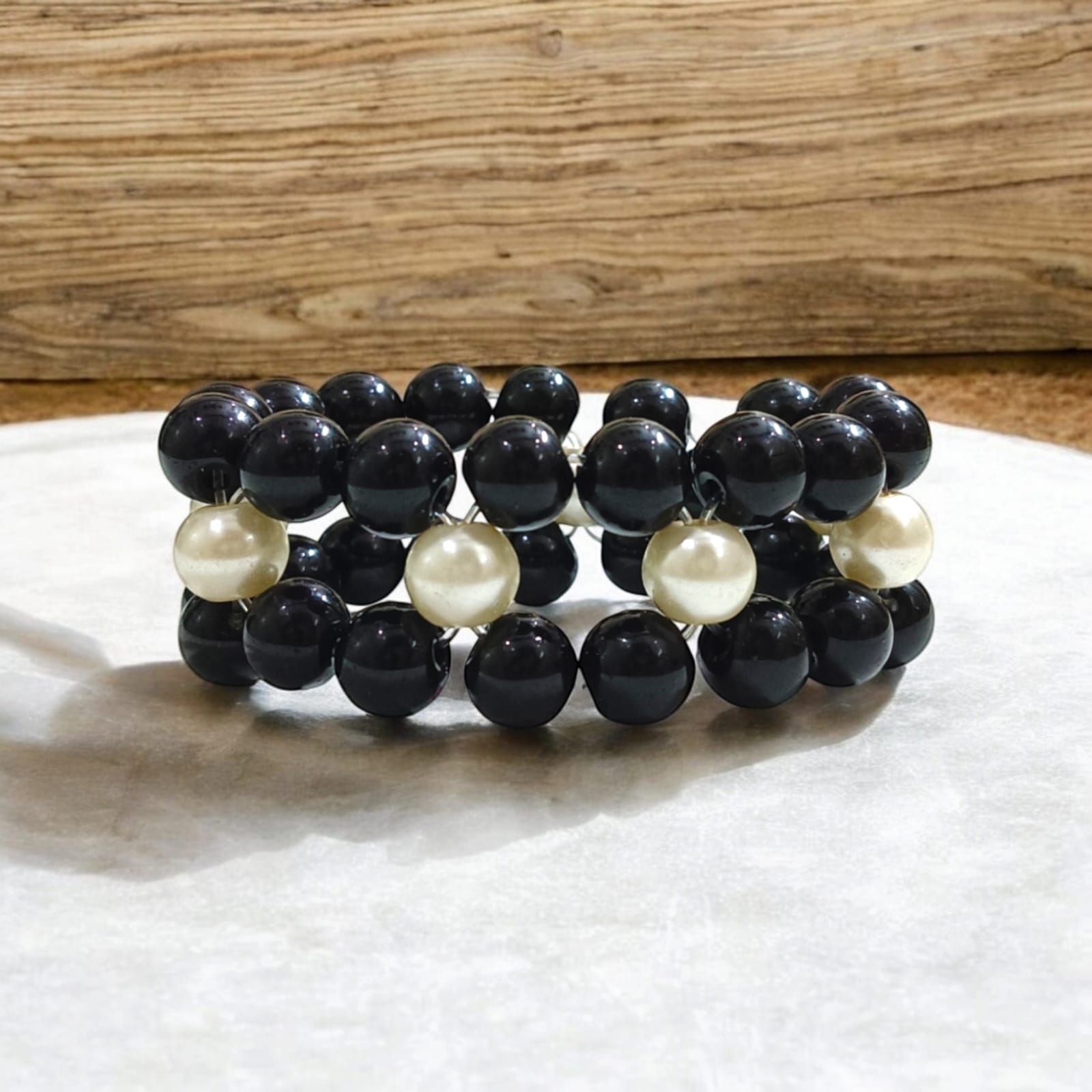 Lab-certified Black Agate and Pearl bracelet with 8MM stretchable beads, designed for protection, attraction, and spiritual growth.