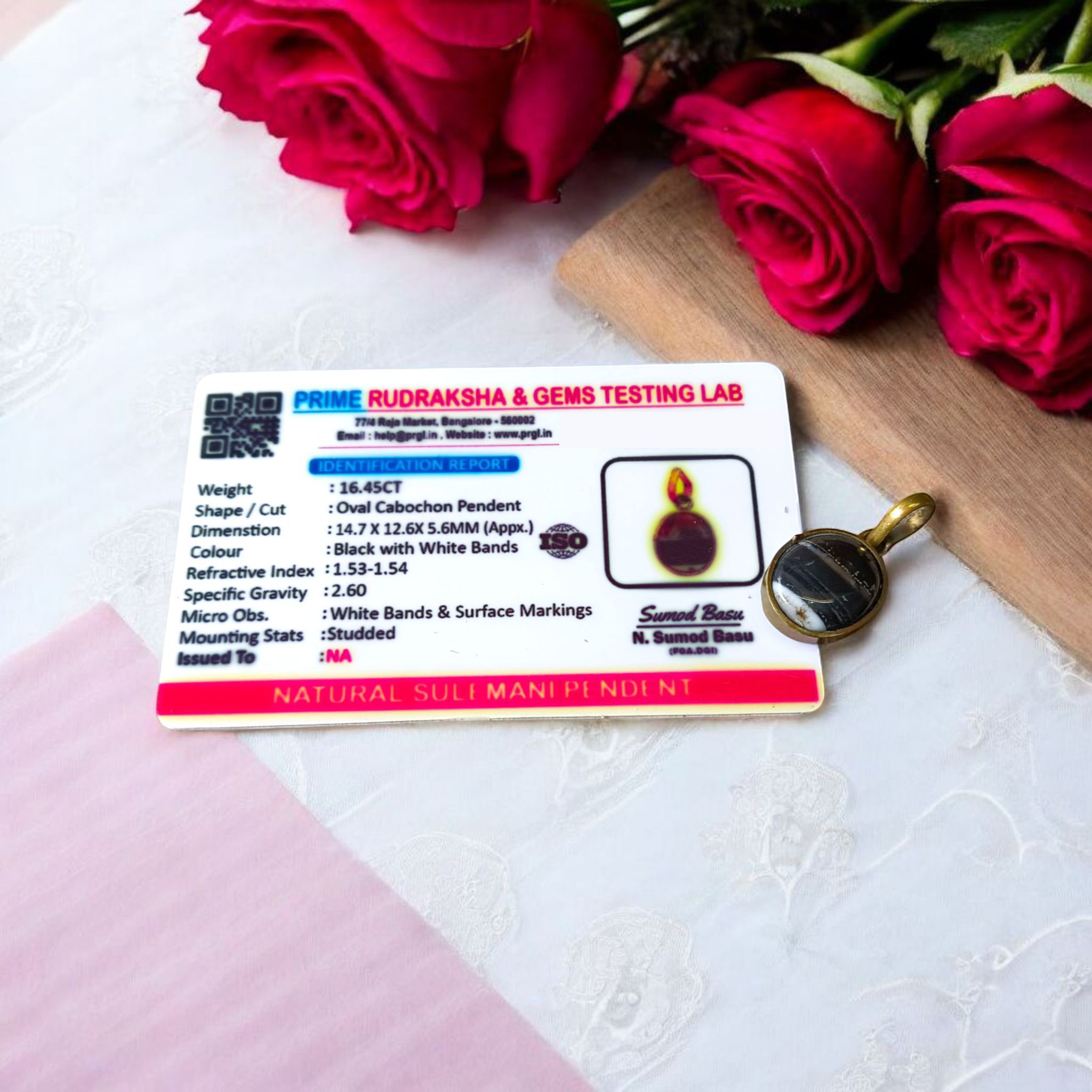 Lab-certified Black Sulemani Hakik gemstone pendant with black thread, known for protection and grounding benefits