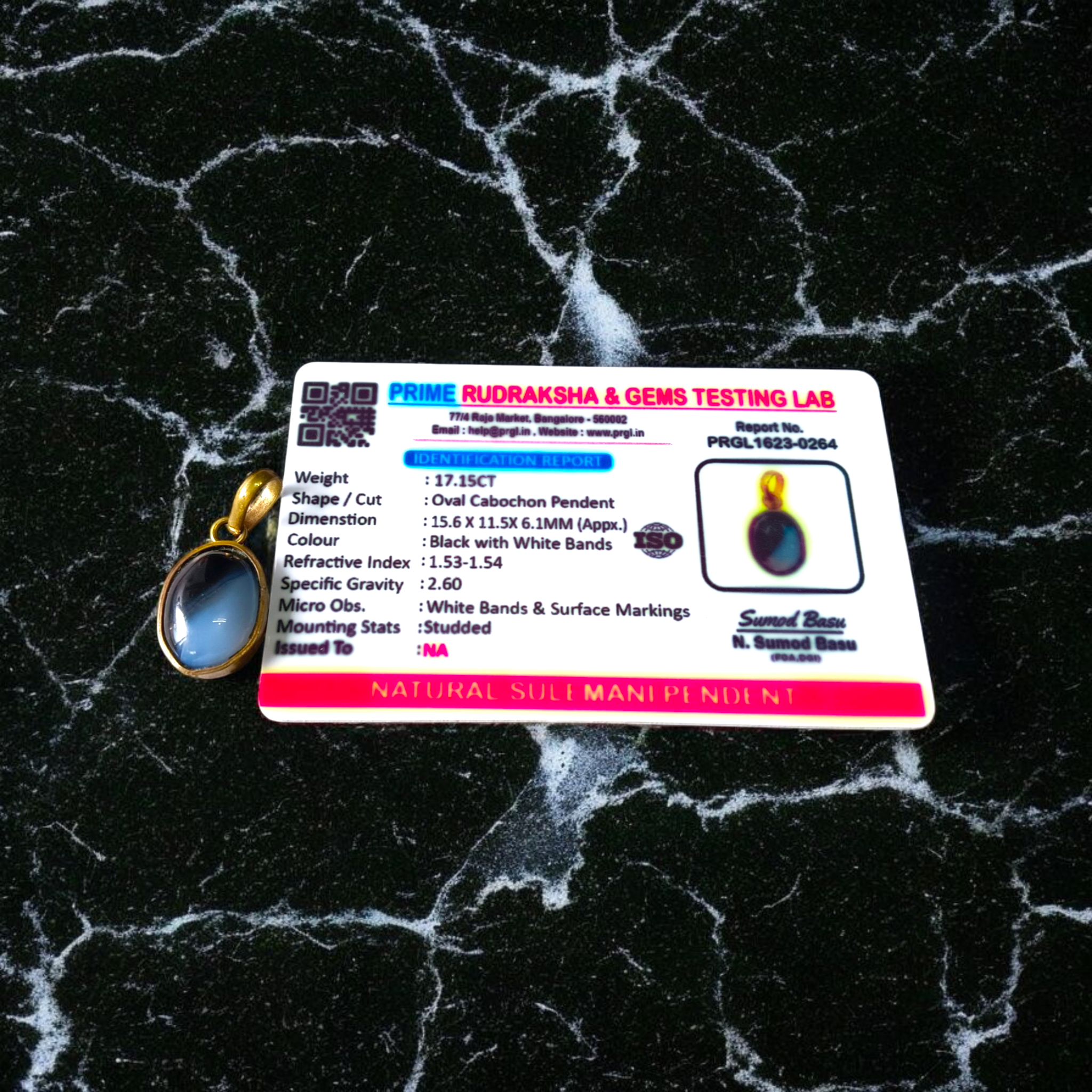 Lab-certified Black Sulemani Hakik gemstone pendant with black thread, known for protection and grounding benefits