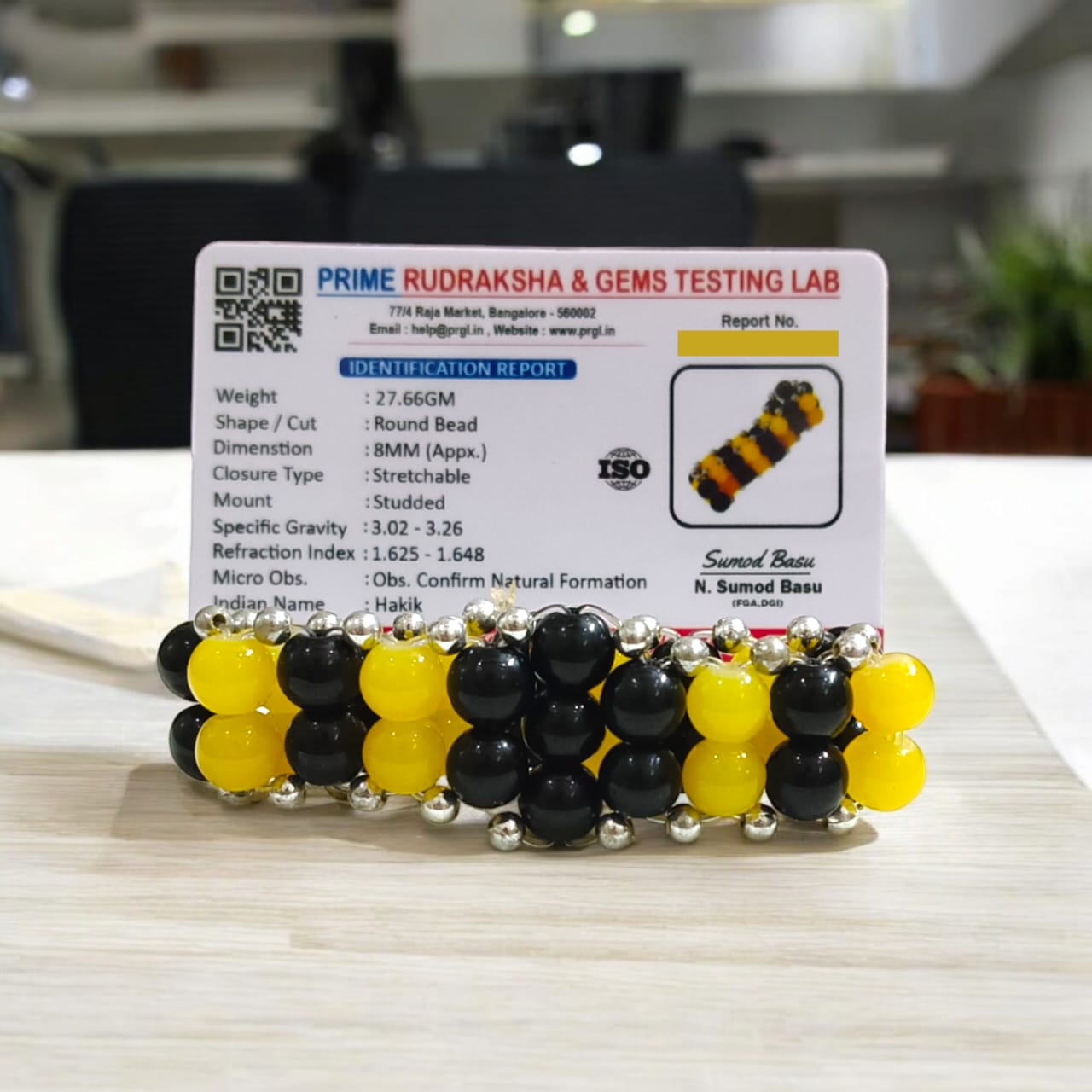 Lab-certified Black and Yellow Agate Bracelet with 8MM beads, stretchable design, providing grounding, focus, and spiritual balance by Timeshopee.