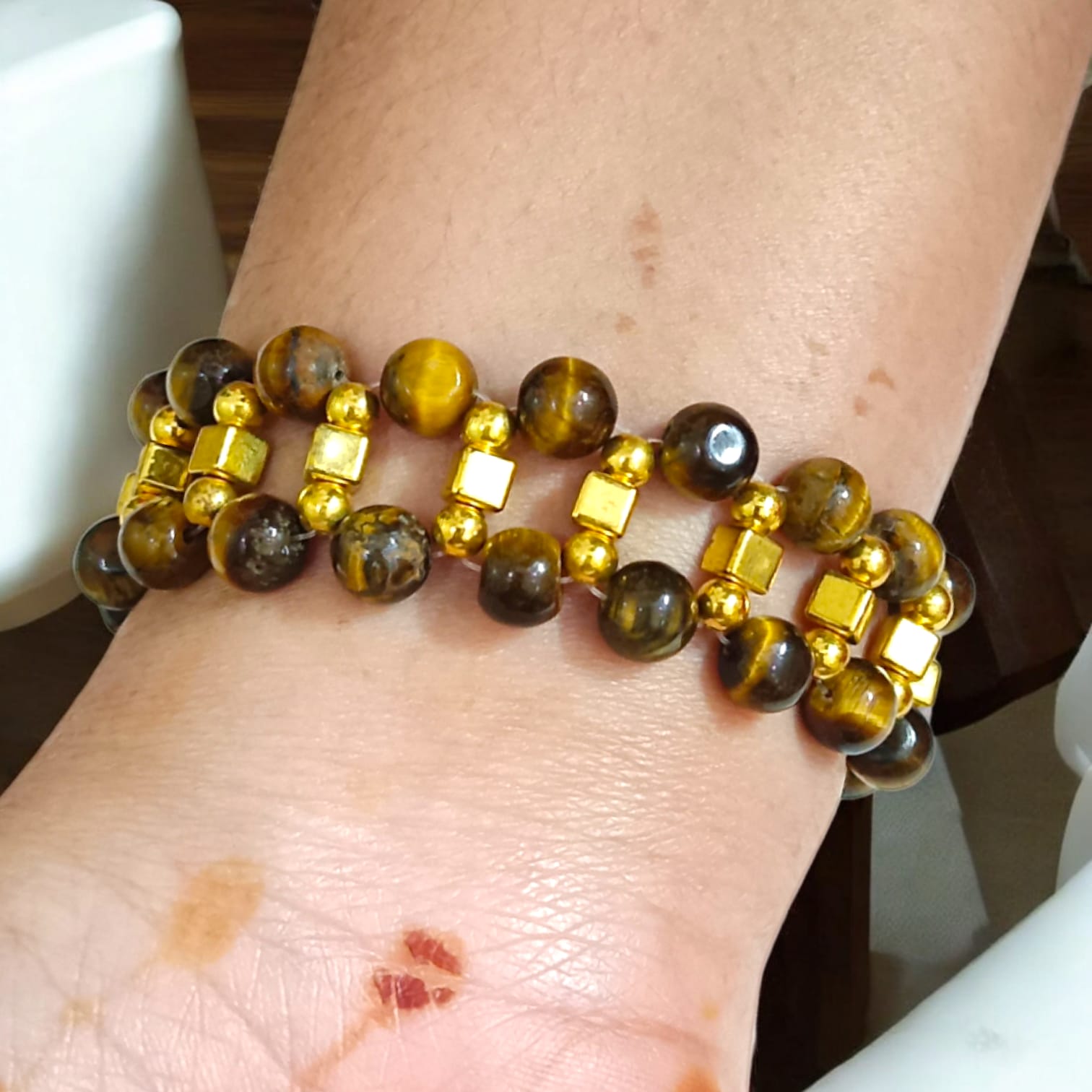 Lab-certified Tiger Eye Bracelet with 7MM beads, featuring golden metal accents and a golden lobster clasp, designed for strength, confidence, and business growth by Timeshopee.