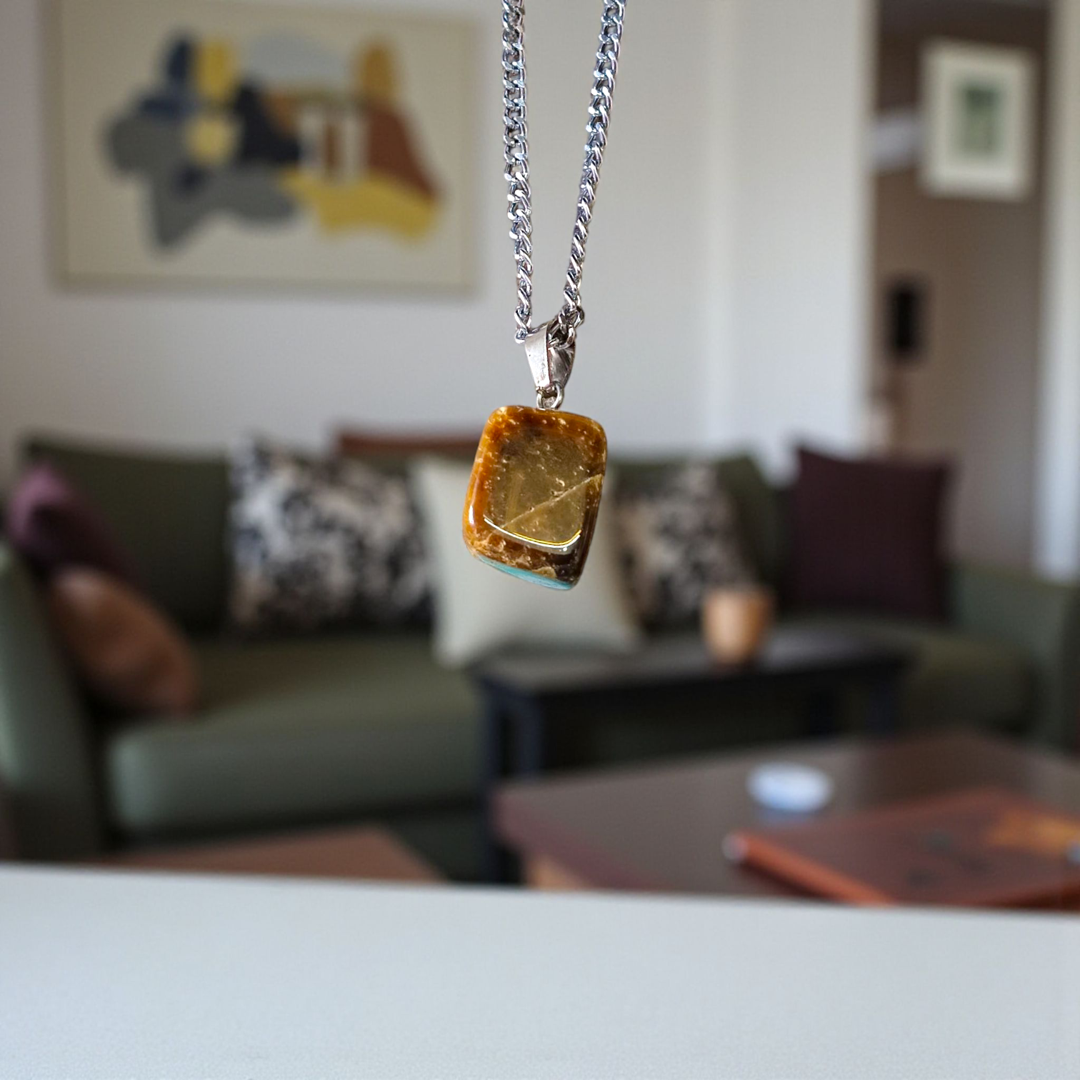 Lab-certified Tiger Eye Pendant with chain, featuring a golden-brown gemstone known for its grounding and protective properties