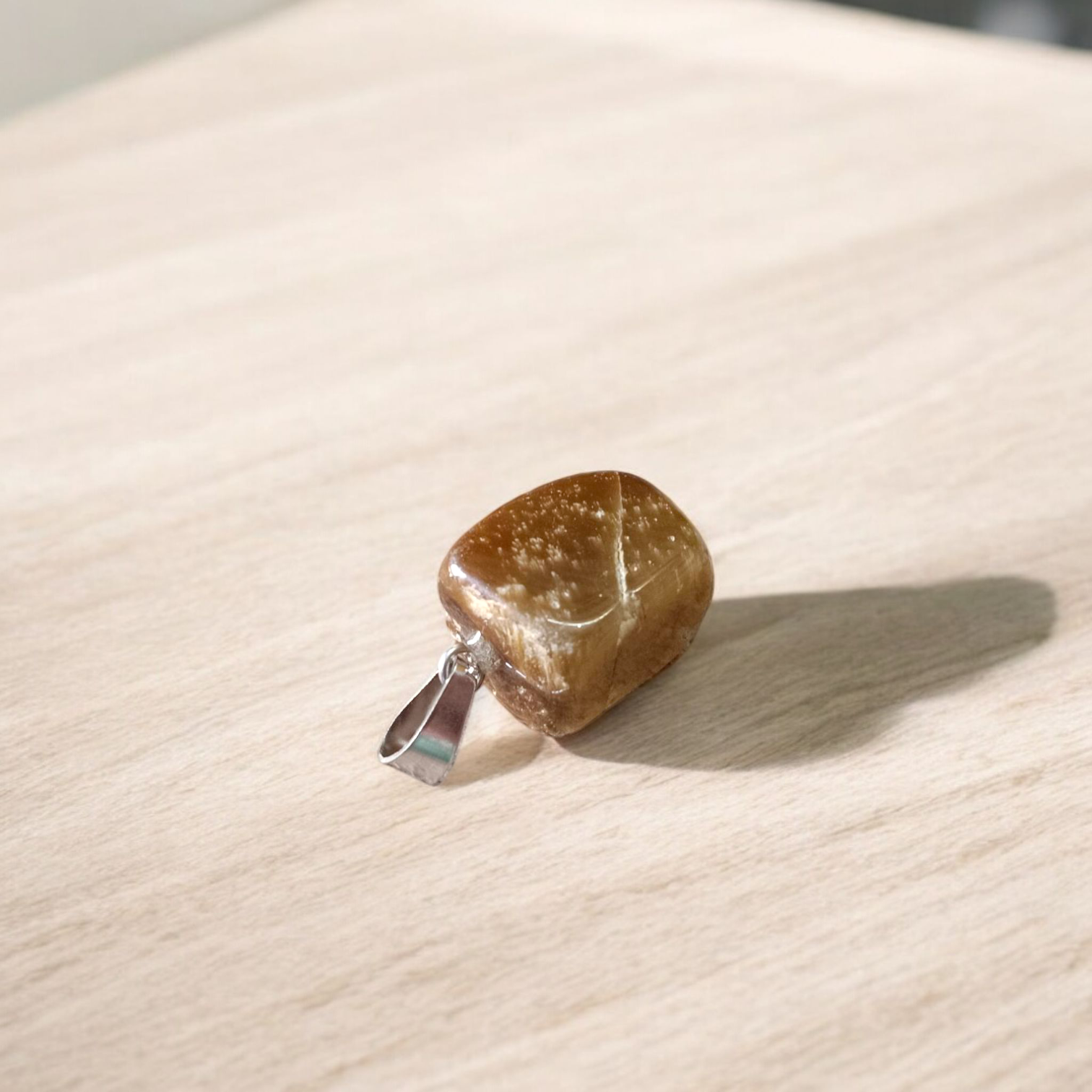 Lab-certified Tiger Eye Pendant with chain, featuring a golden-brown gemstone known for its grounding and protective properties