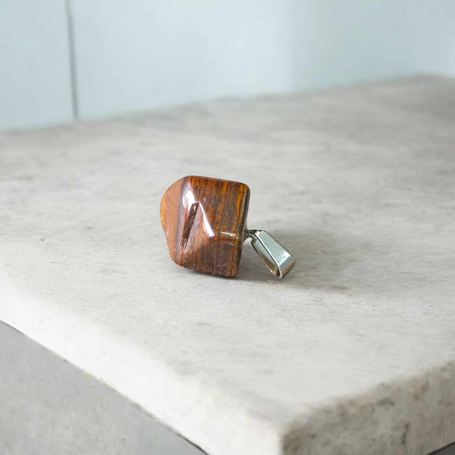 Lab-certified Tiger Eye Pendant with chain, featuring a golden-brown gemstone known for its grounding and protective properties