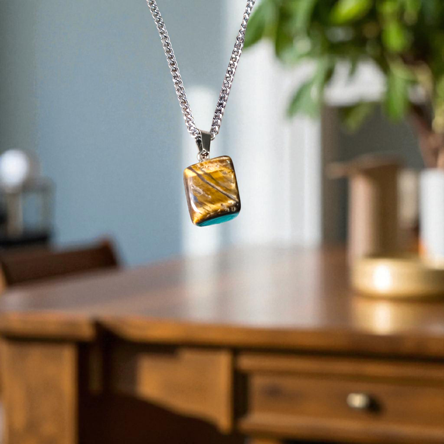 Lab-certified Tiger Eye Pendant with chain, featuring a golden-brown gemstone known for its grounding and protective properties