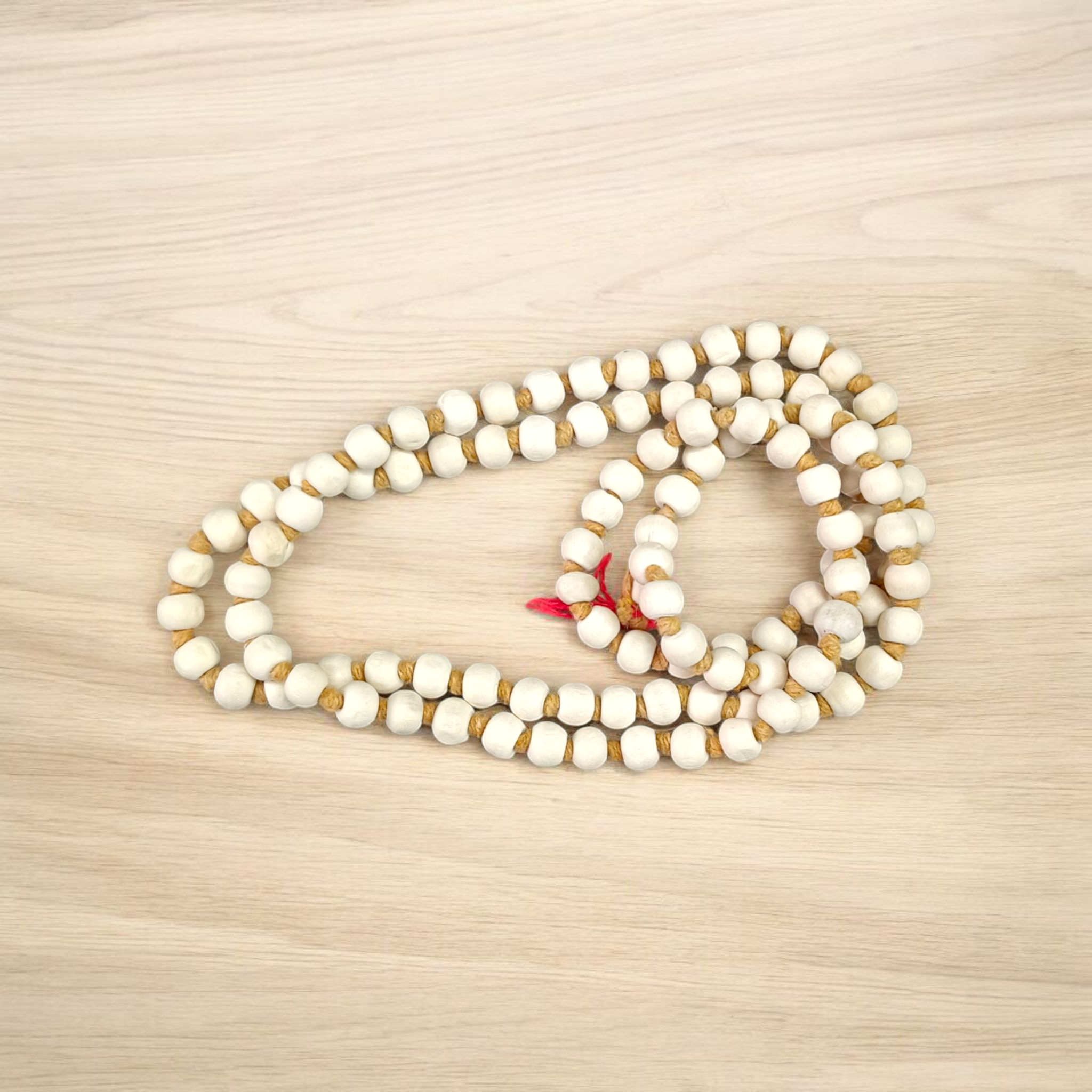 Lab-certified Tulsi Mala with 108+1 beads, used for meditation and spiritual practices, featuring traditional and sacred Tulsi beads