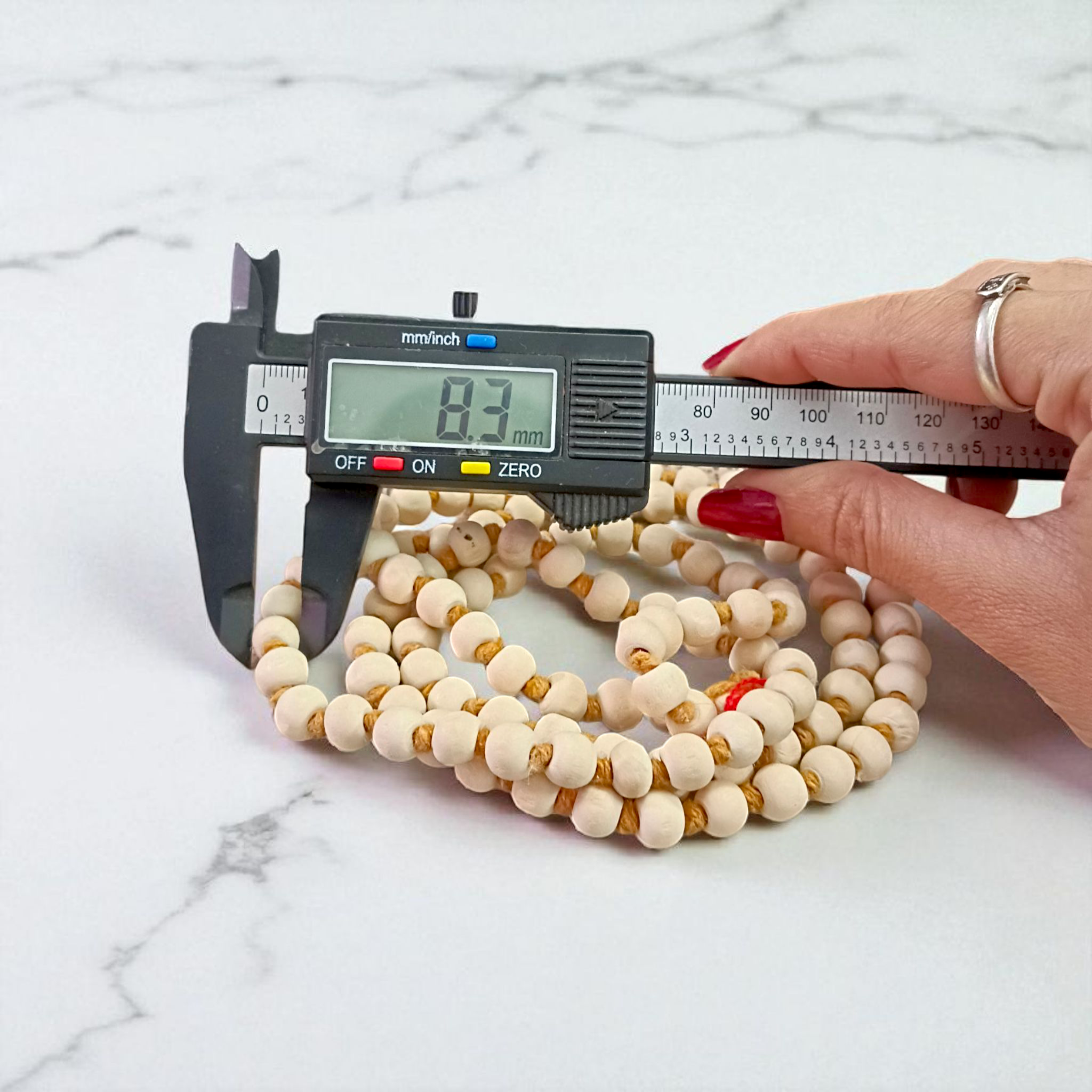 Lab-certified Tulsi Mala with 108+1 beads, used for meditation and spiritual practices, featuring traditional and sacred Tulsi beads