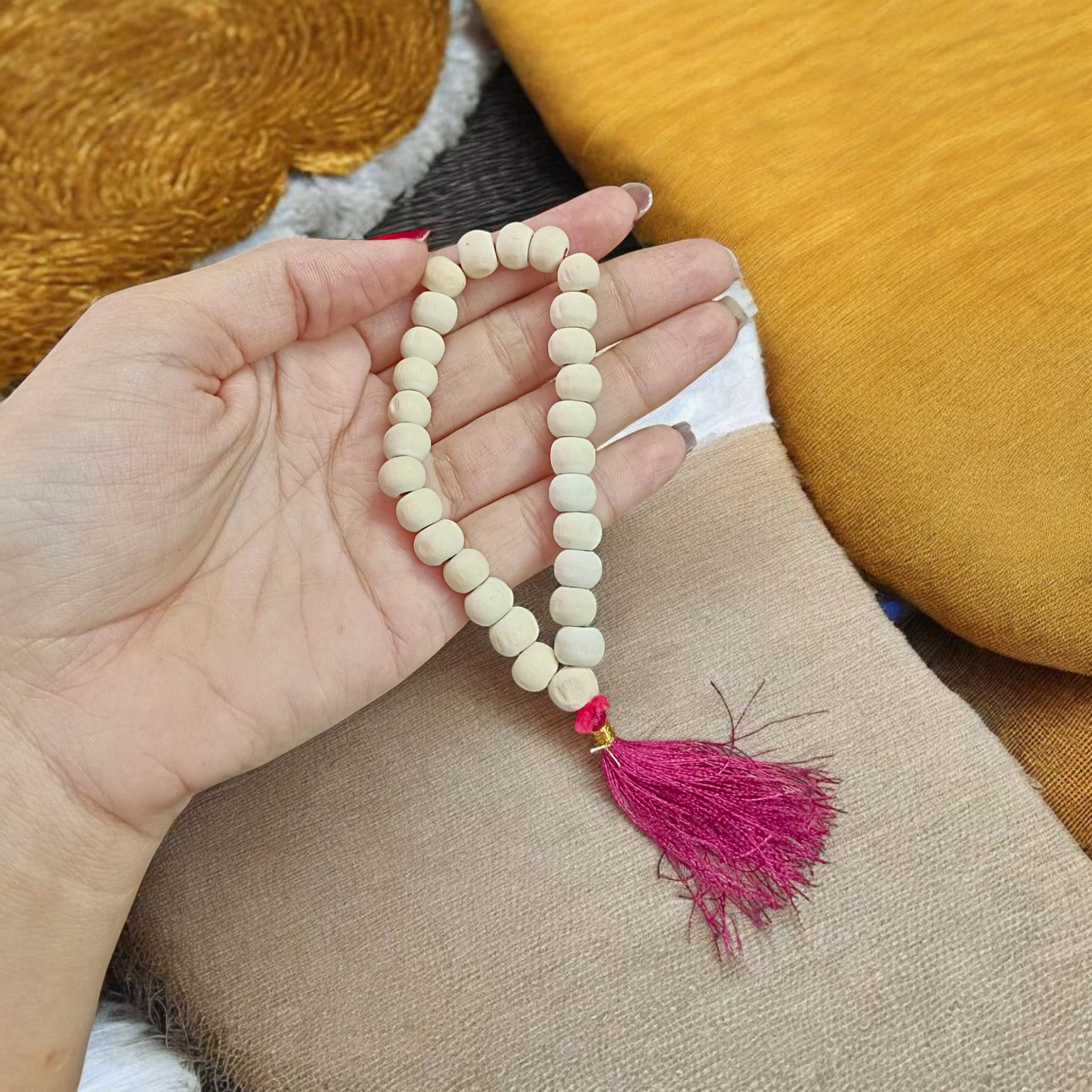 Lab-certified Tulsi Mala with 27+1 beads, used for meditation and spiritual practices, featuring traditional and sacred Tulsi beads