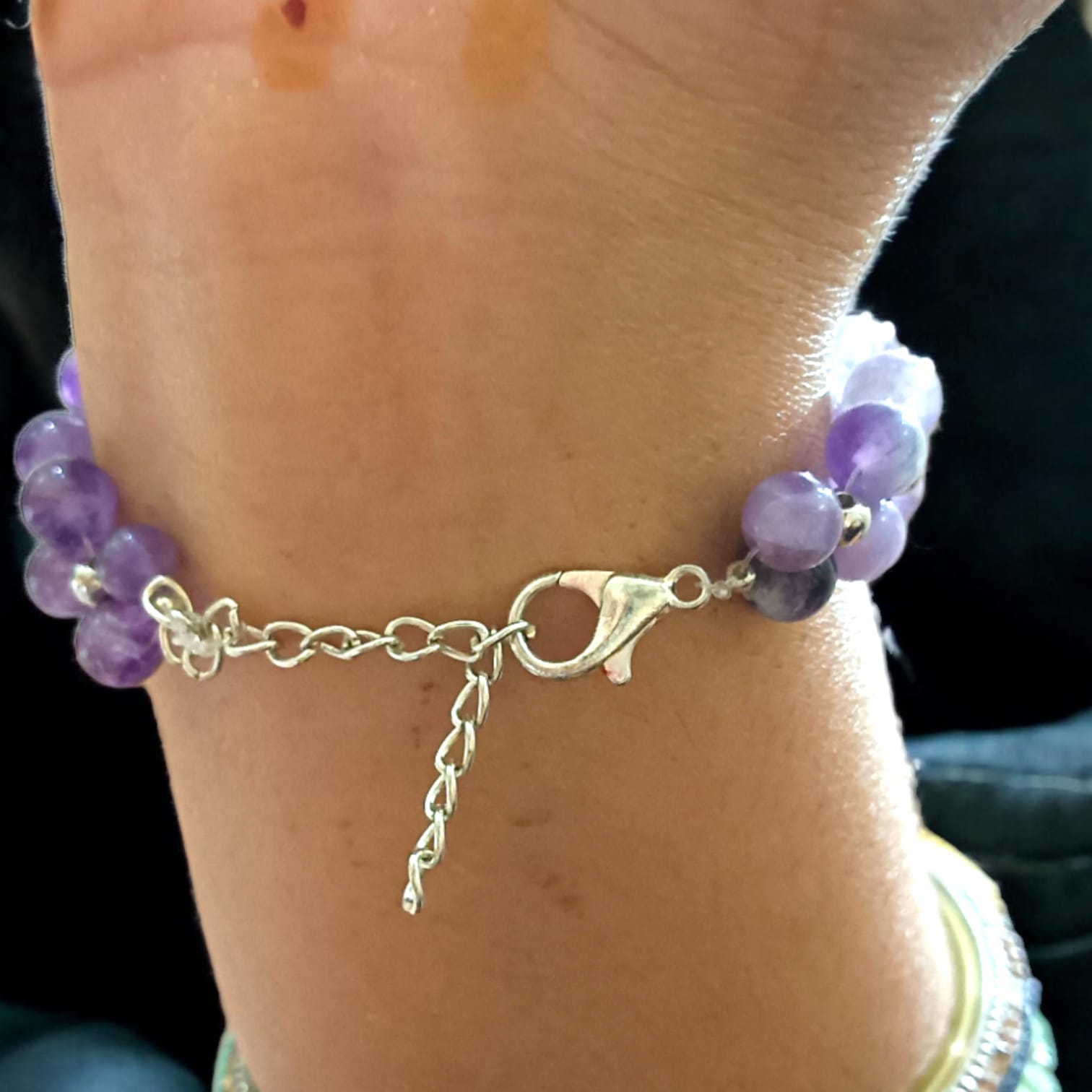 Lab Certified Amethyst Bracelet from Timeshopee with 8MM beads and an adjustable lobster clasp, perfect for stylish wear and spiritual benefits.