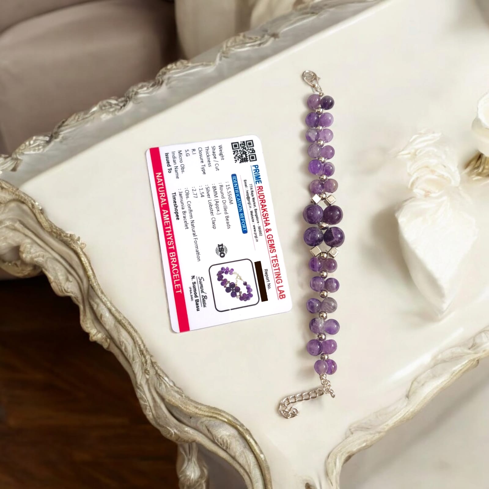 Lab Certified Amethyst Bracelet from Timeshopee with 8MM beads and an adjustable lobster clasp, perfect for stylish wear and spiritual benefits.