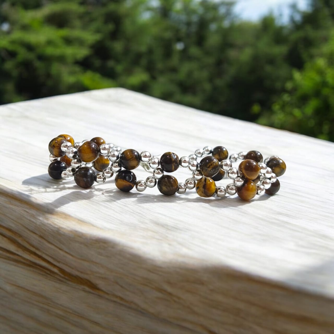 Lab Certified Genuine Tiger Eye Bracelet with 7MM beads, silver bead accents, adjustable lobster clasp, stylish design for confidence and strength.
