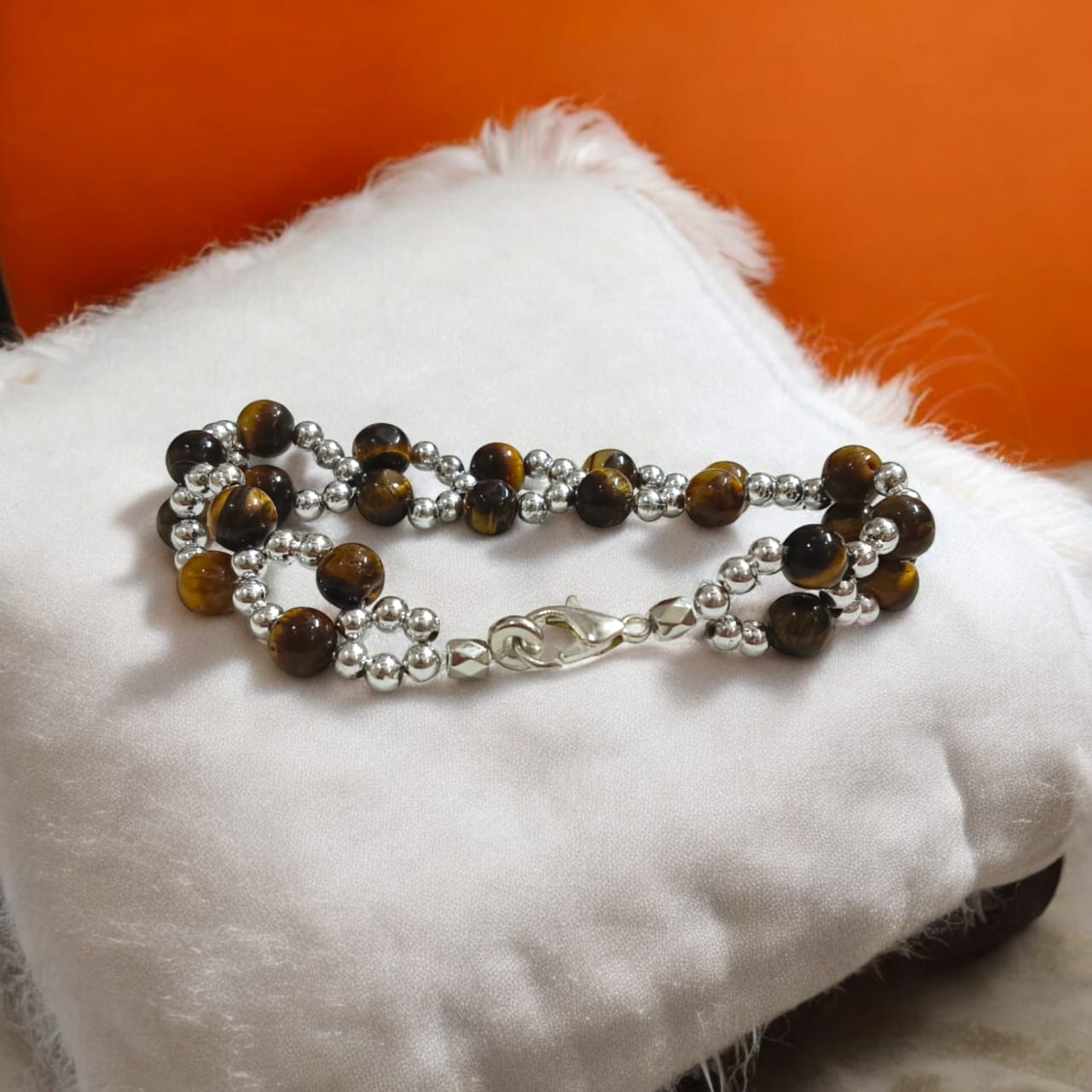 Lab Certified Genuine Tiger Eye Bracelet with 7MM beads, silver bead accents, adjustable lobster clasp, stylish design for confidence and strength.