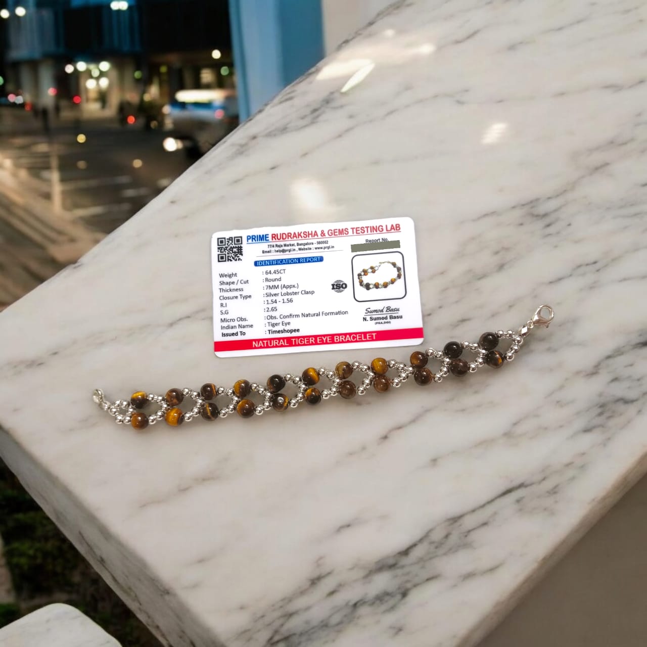 Lab Certified Genuine Tiger Eye Bracelet with 7MM beads, silver bead accents, adjustable lobster clasp, stylish design for confidence and strength.