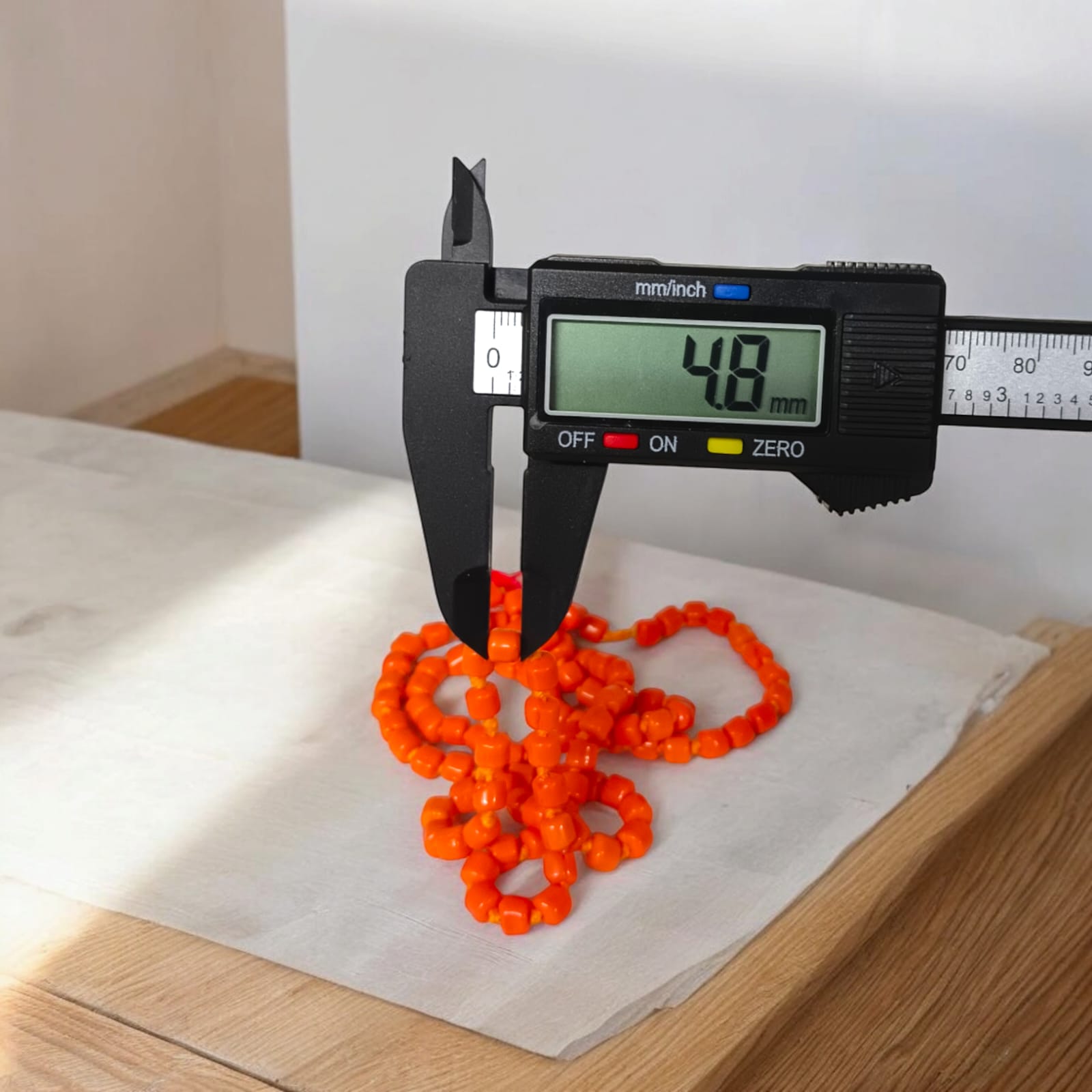 Lab Certified Orange Monga Mala from Timeshopee, ideal for spiritual practices, meditation, and as a vibrant accessory.