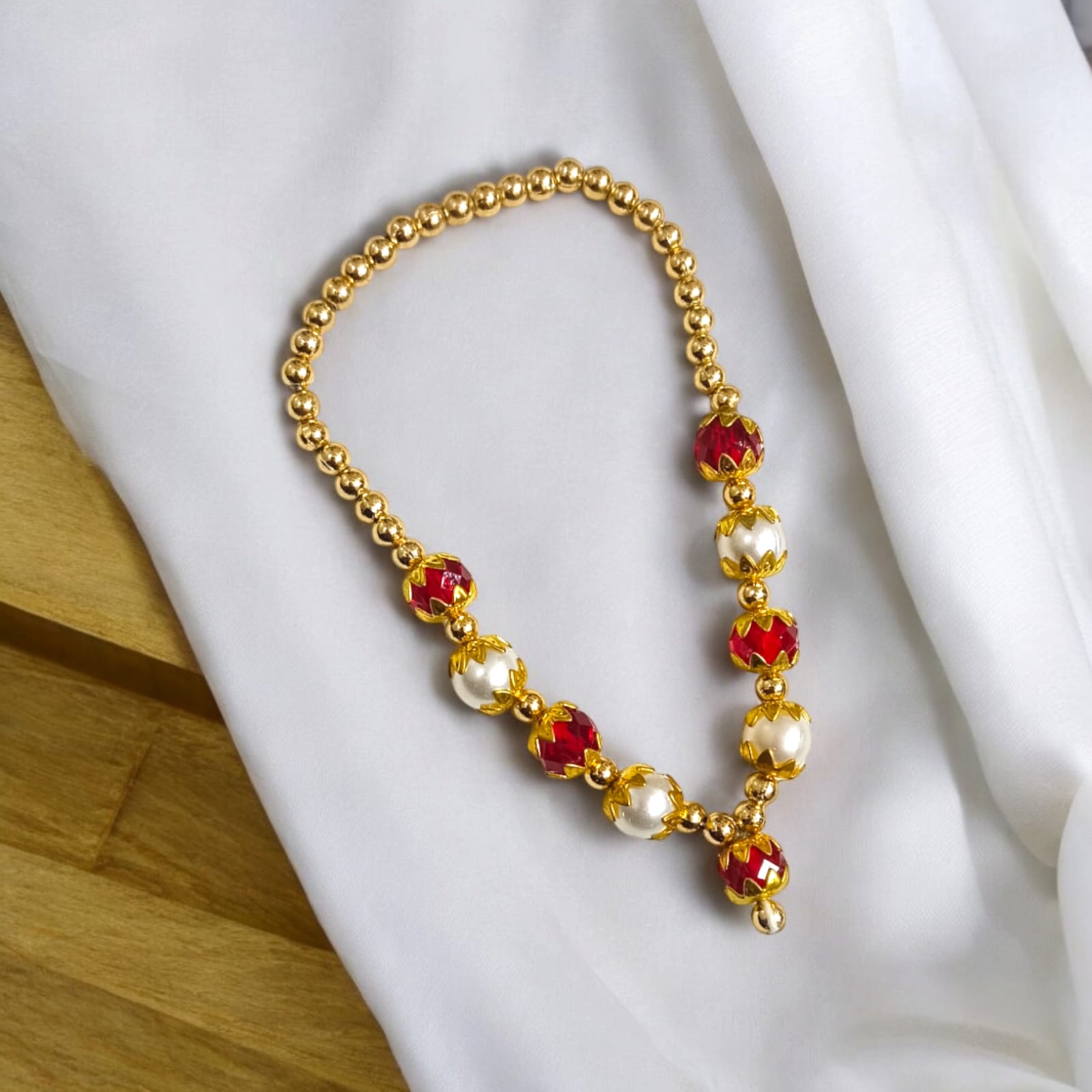 Laddu Gopal Mala with Pearl and Zircon beads in red, white, and golden colors by Timeshopee