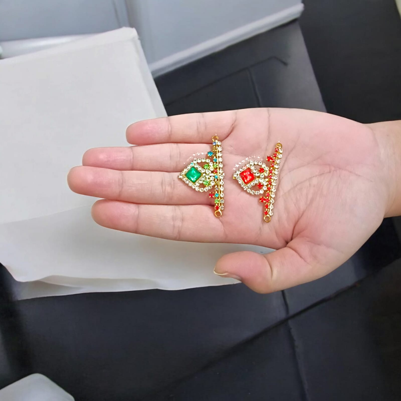 Laddu Gopal Mukut with Zircon Design in Red and Green colors, featuring an adjustable fit, by Timeshopee