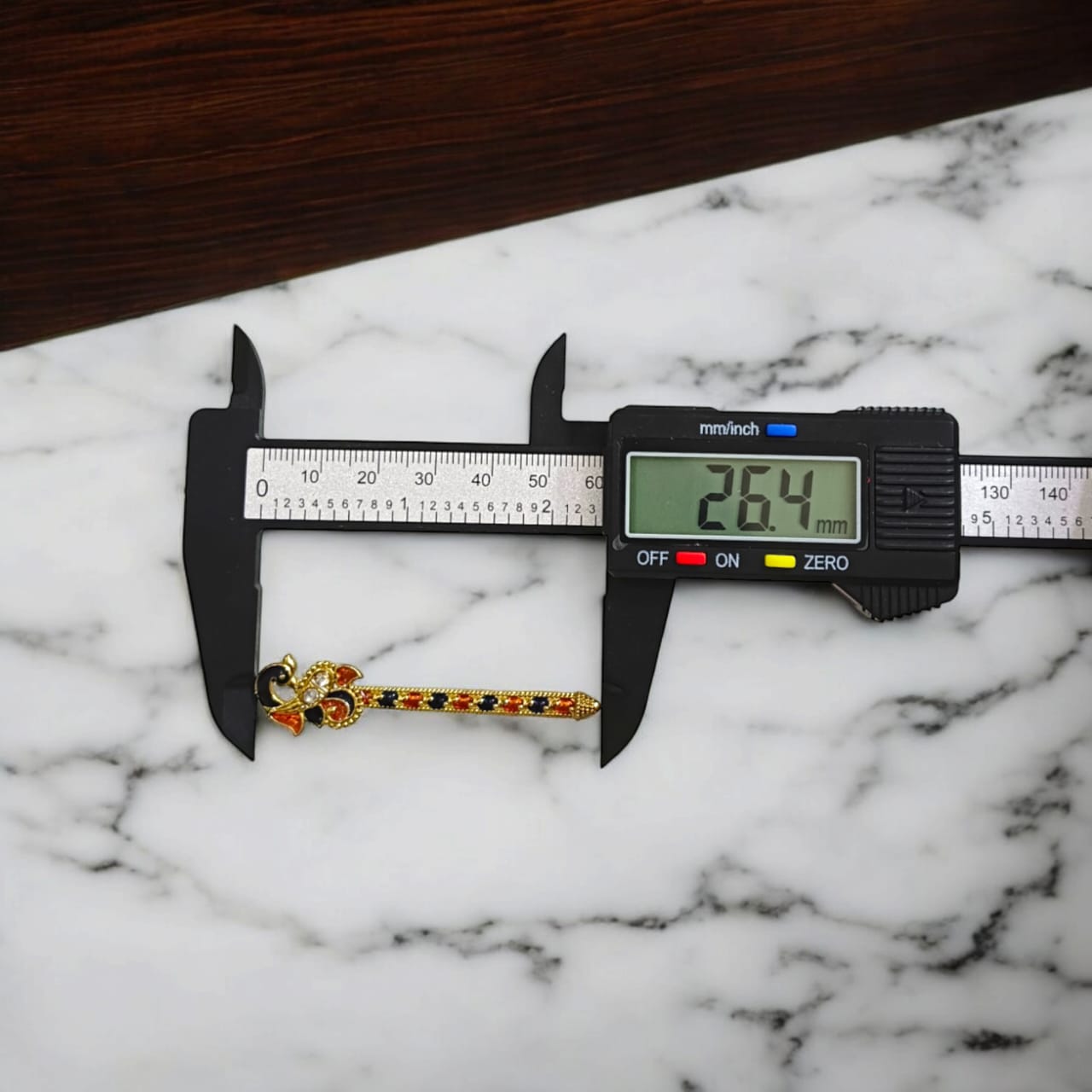 Laddu Gopal bansuri with peacock feather design, a unique and beautifully crafted flute accessory for Bal Gopal idols.